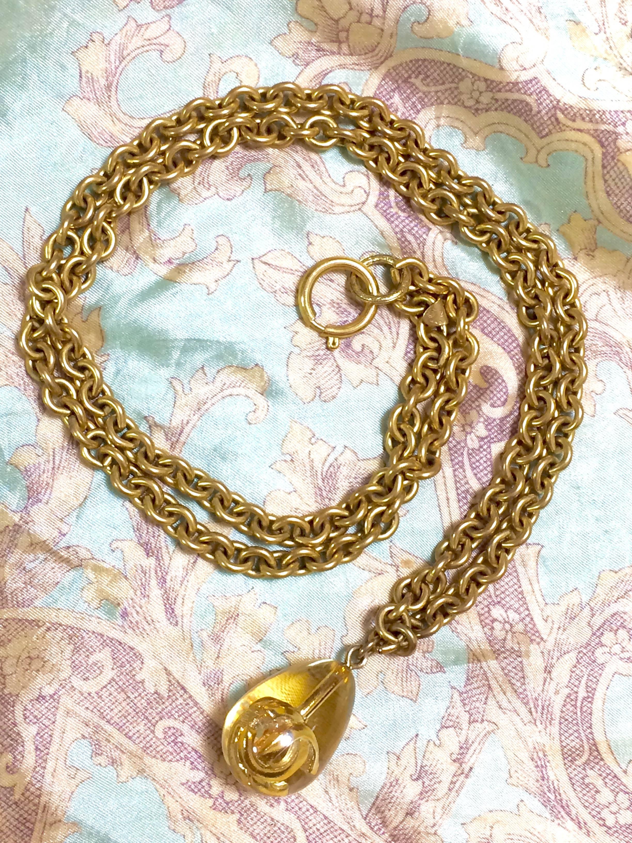 Vintage CHANEL long chain necklace with clear and gold teardrop CC pendant top. For Sale 1
