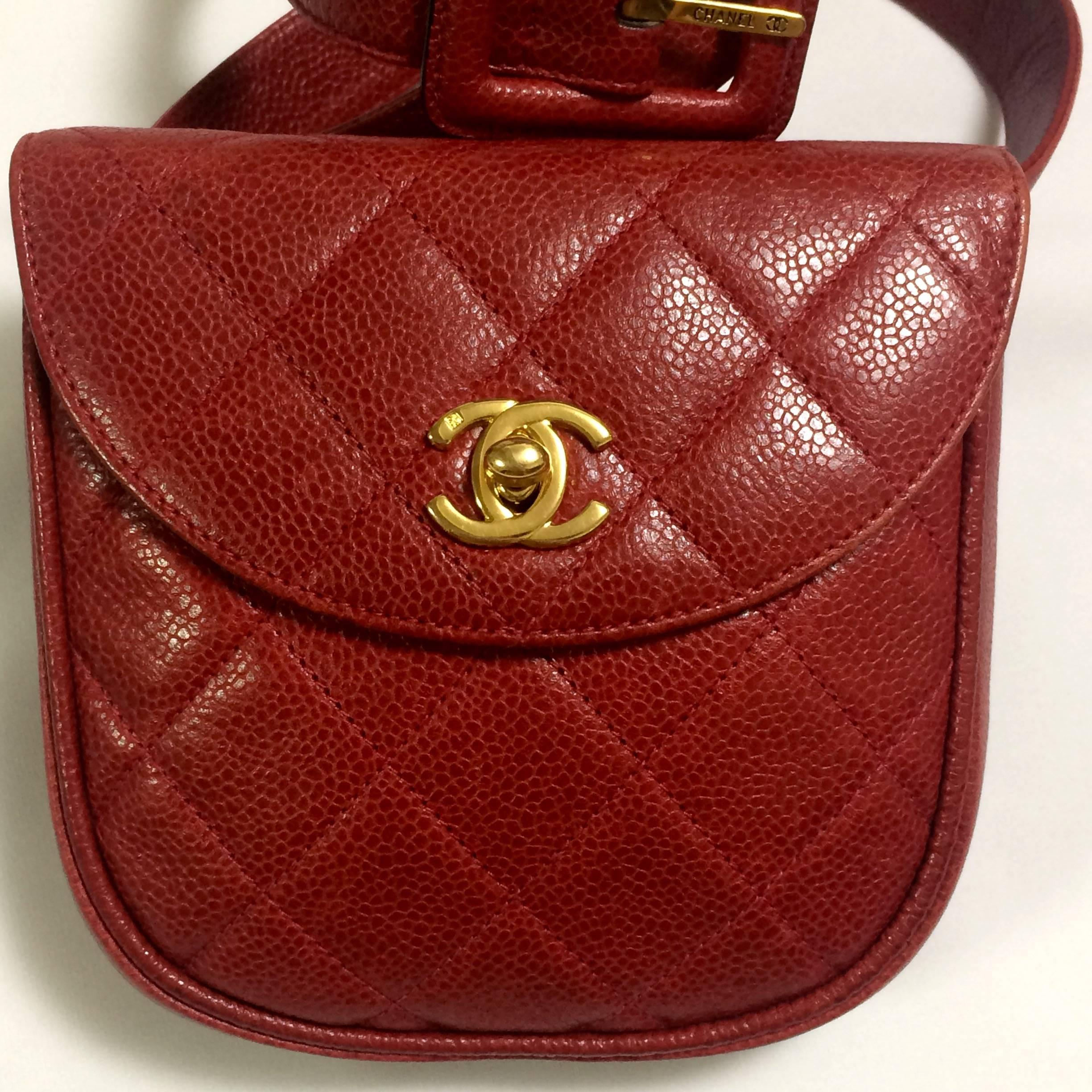 1990s. Vintage CHANEL oval shape 2.55 red caviar leather waist purse, hip bag, fanny pack with golden CC closure and a matching belt.

Classic bag but rare color. Must have piece for your collection! 

Introducing a vintage CHANEL red caviar leather