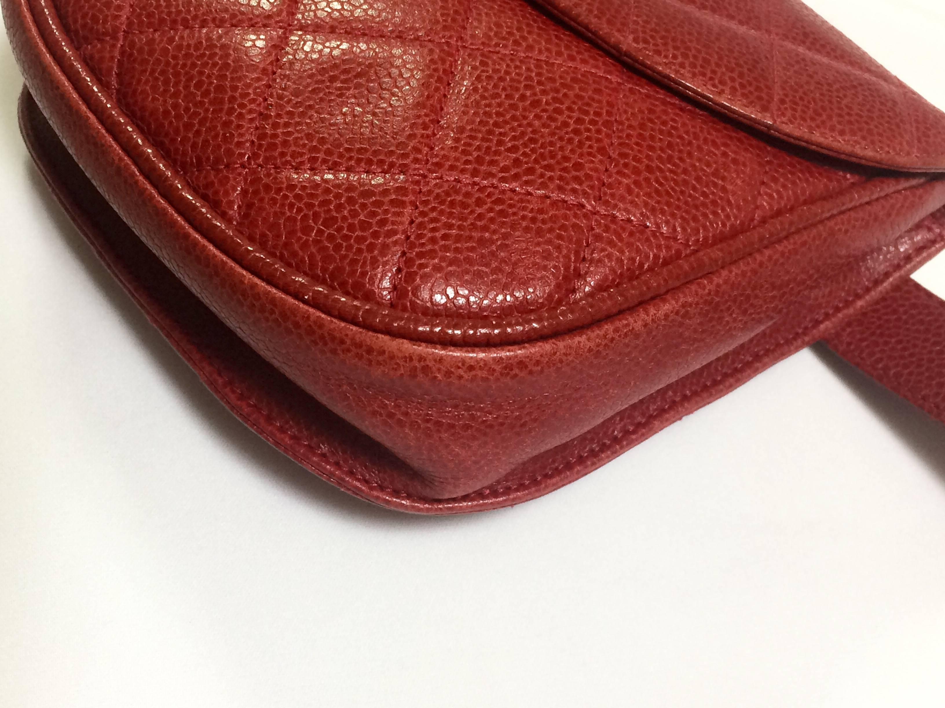 Women's Vintage CHANEL 2.55 red caviar leather waist purse, fanny pack with golden cc.