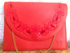 Vintage Valentino Garavani red clutch shoulder bag with flower embroidery deco.