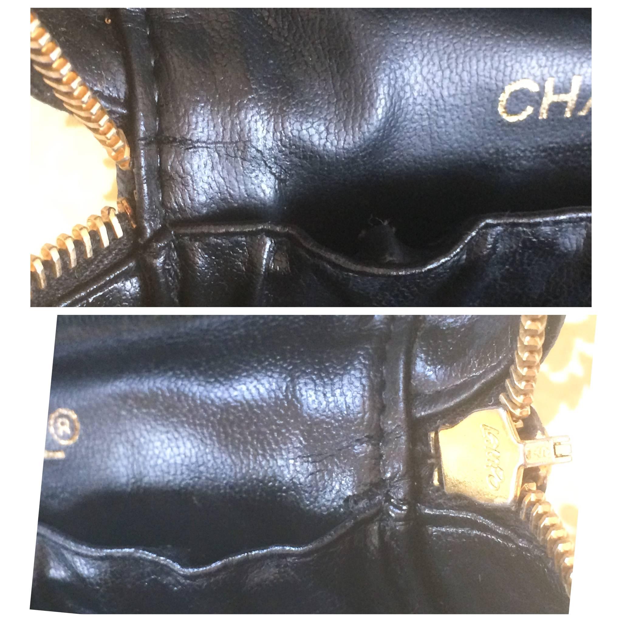 Women's Vintage CHANEL black caviar cosmetic case, vanity bag, mini purse with CC mark.