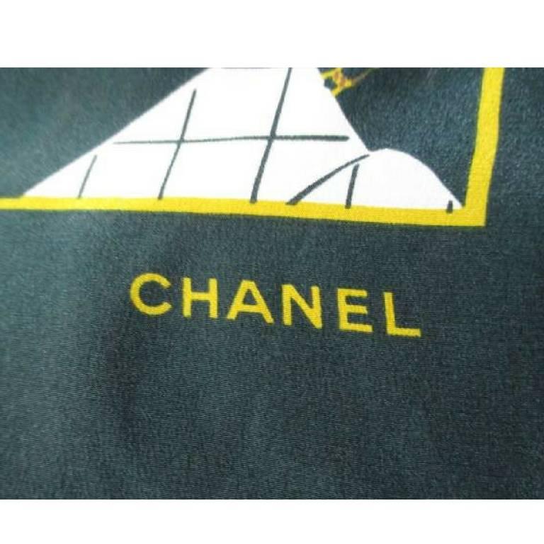 1990s. Vintage CHANEL dark green and white supermodel and 2.55 bag print pattern large silk scarf. Gorgeous foulard.

This is a 100% silk scarf from CHANEL in the 90s. 
With white and dark green combination, the CHANEL's CC motif, supermodel,