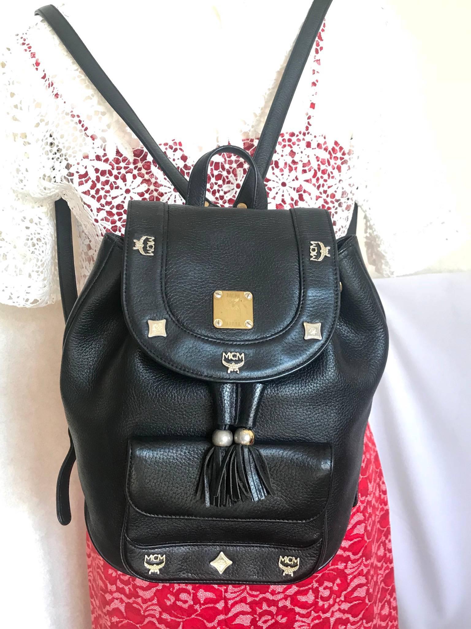 Vintage MCM black backpack with golden studded motifs, by Michael Cromer For Sale 1