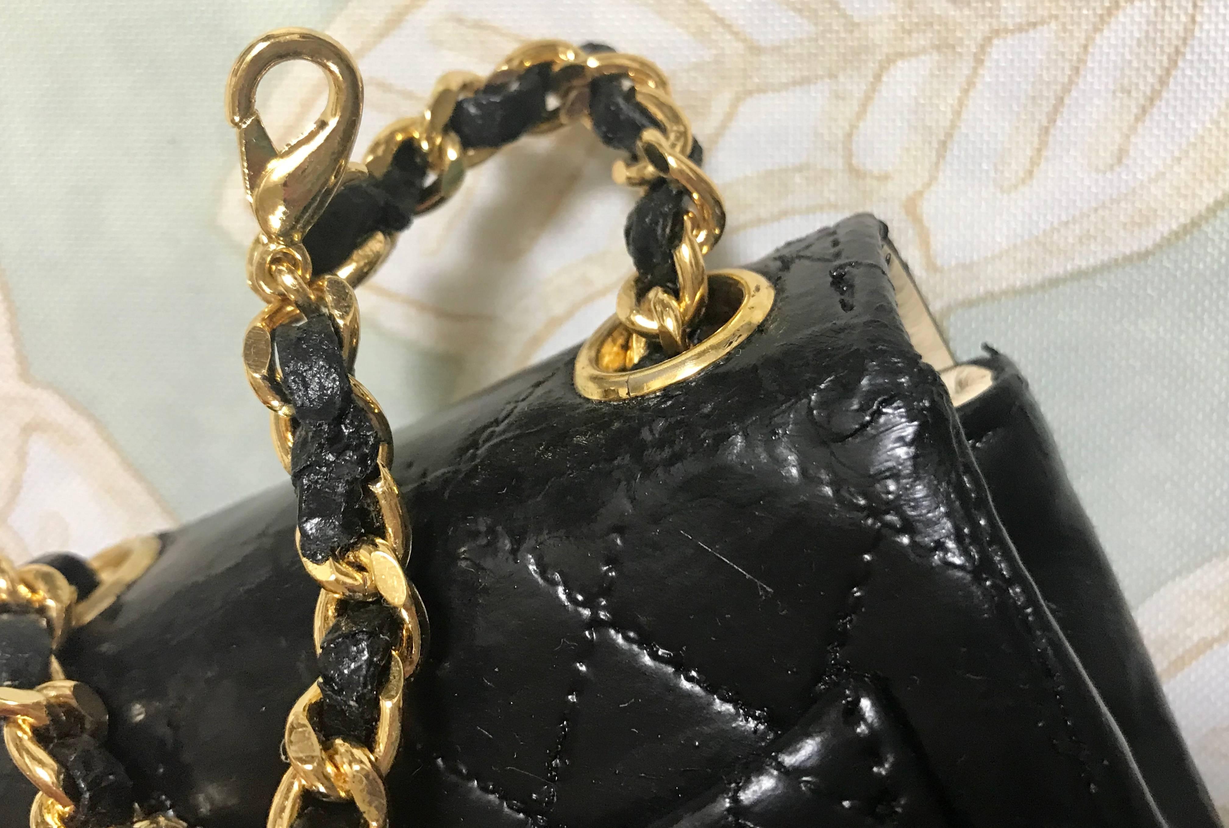 Women's Vintage CHANEL mini 2.55 bag charm chain leather belt with golden CC charm.