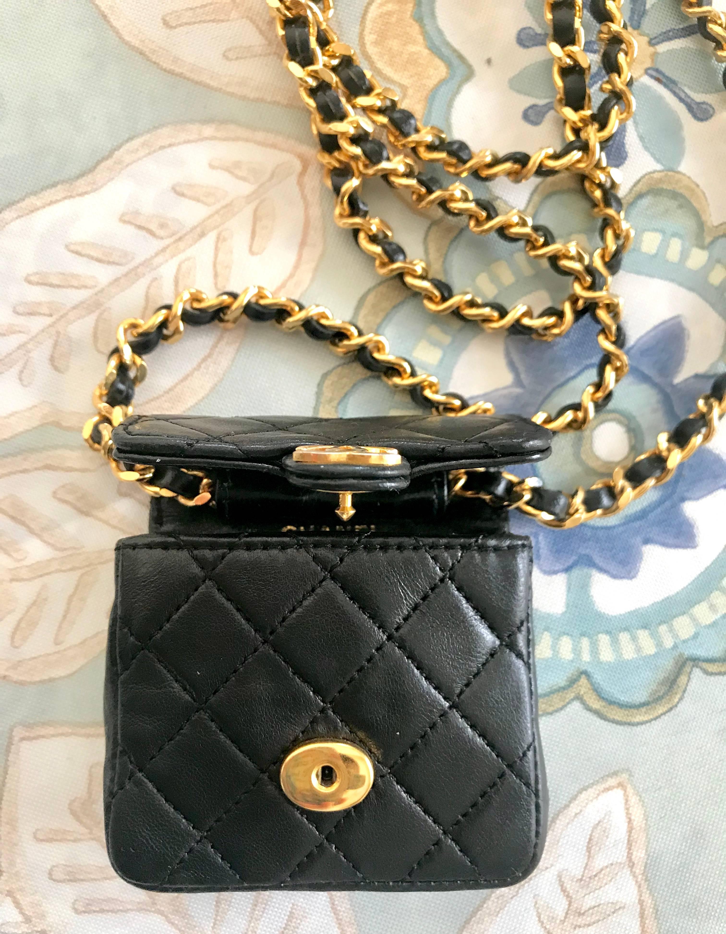 Vintage Chanel black mini 2.55 bag/necklace with long chain and leather strap. 1
