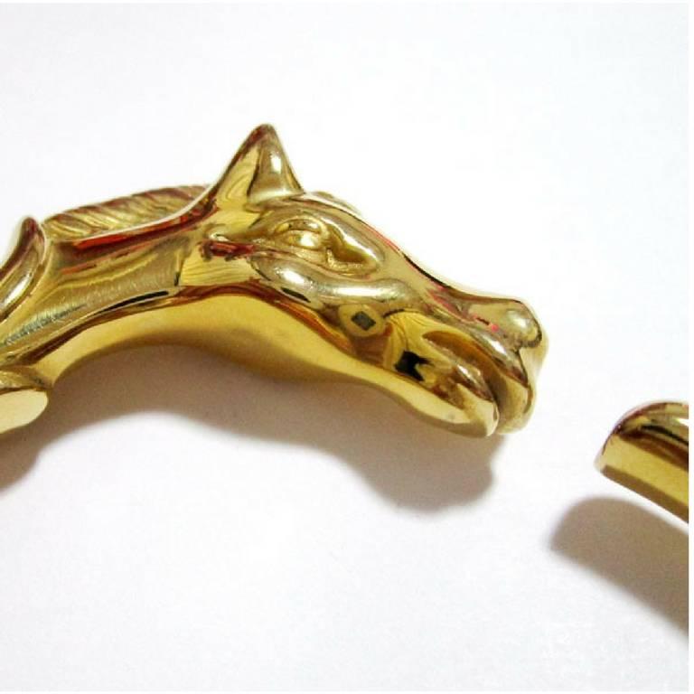 1990s. Vintage Hermes golden horse head design bangle, bracelet. Beautiful classic jewelry from Hermes.

Introducing another beautiful jewelry, gold-plated bangle from HERMES....
The iconic horse head design.

Best vintage jewelry gift.

The