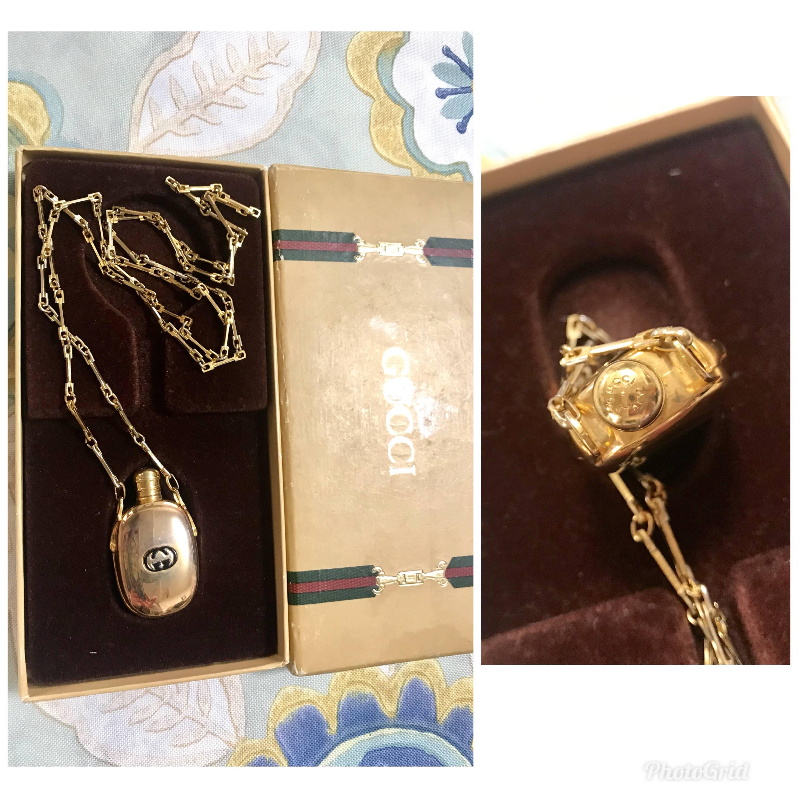 Vintage Gucci golden perfume bottle necklace with logo mark on top.  5