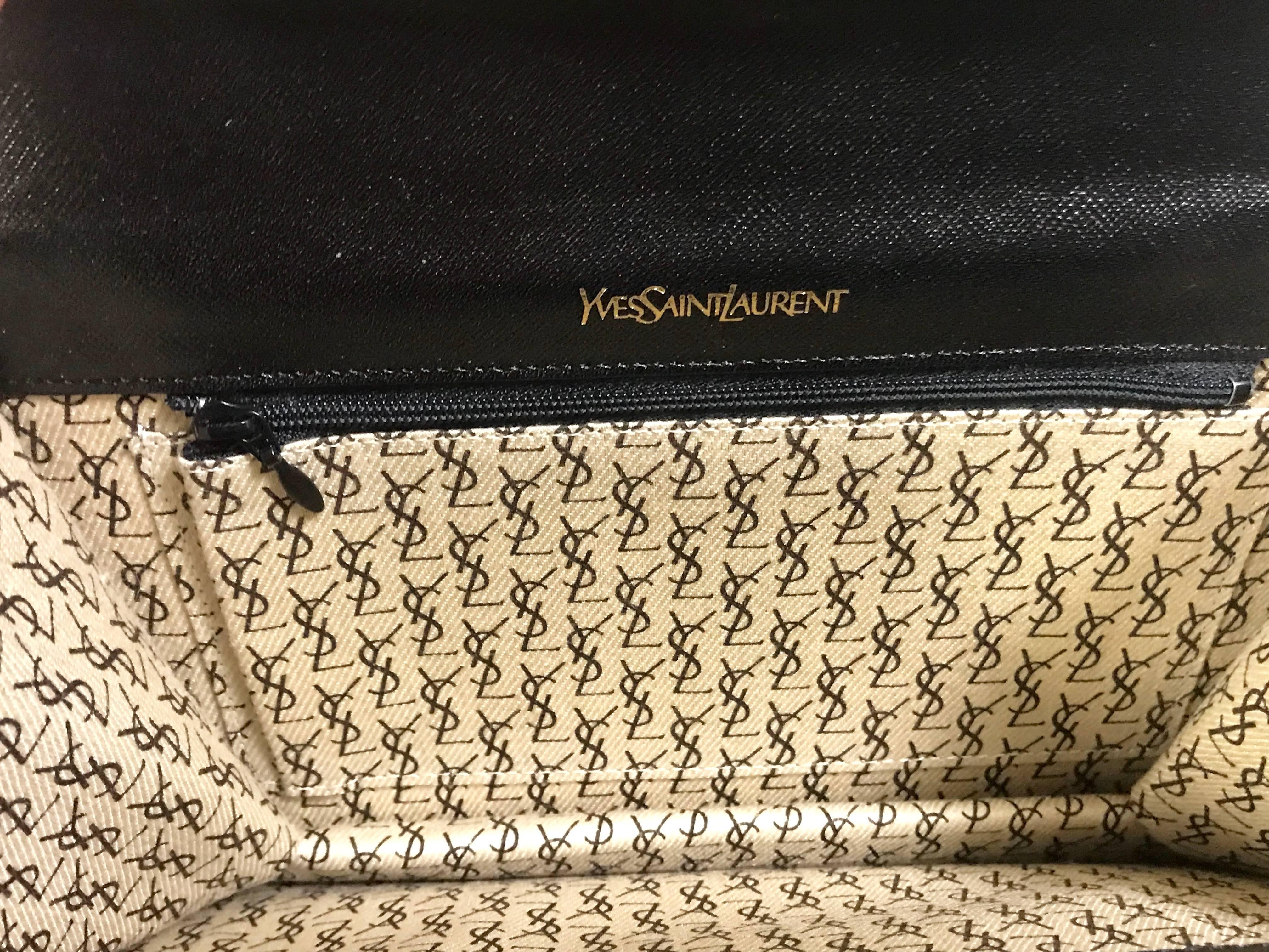 Vintage Yves Saint Laurent genuine black leather clutch purse with beak tip flap 2