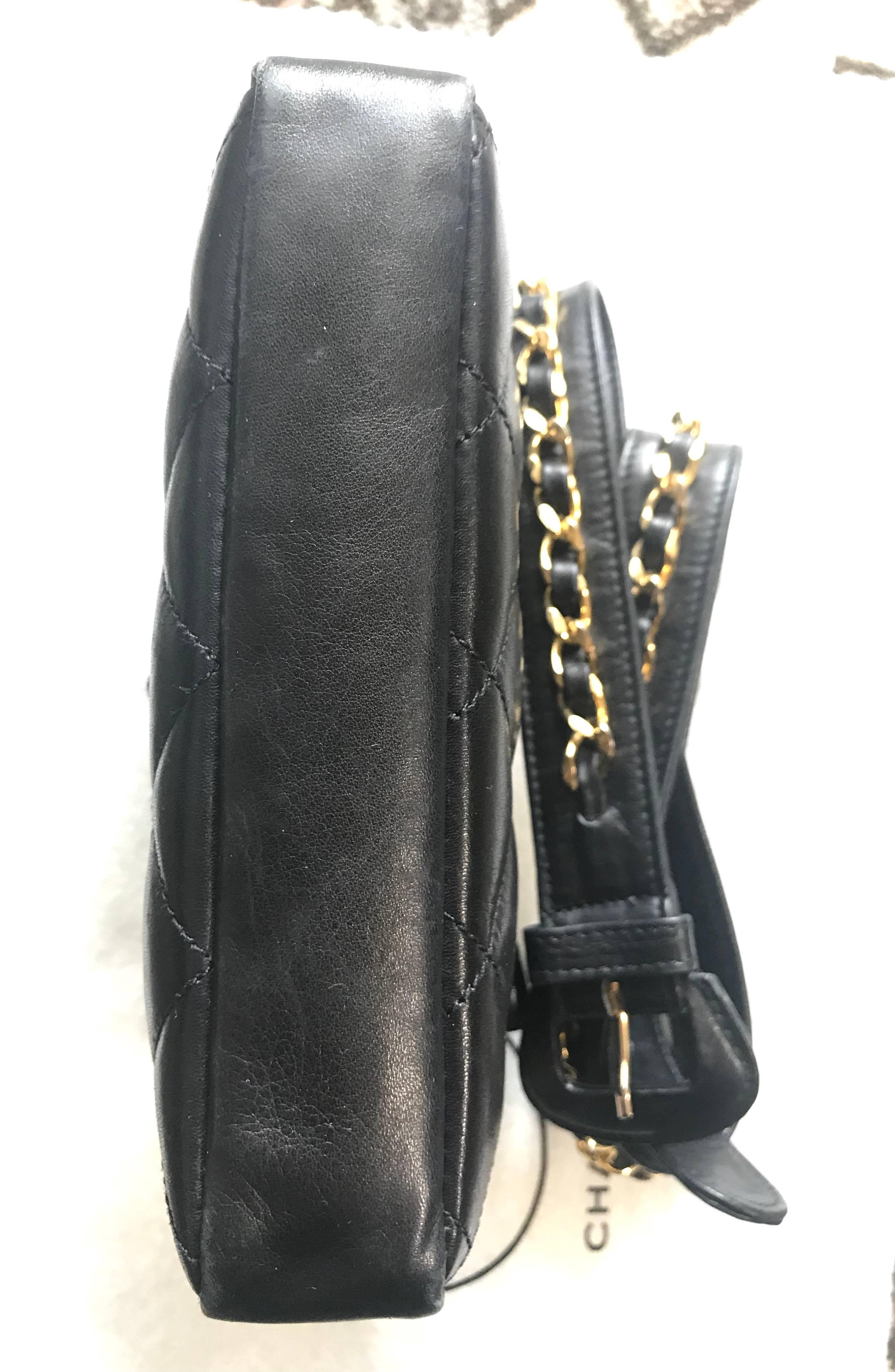Vintage CHANEL black lamb waist bag, fanny pack with golden chain belt & CC. 1