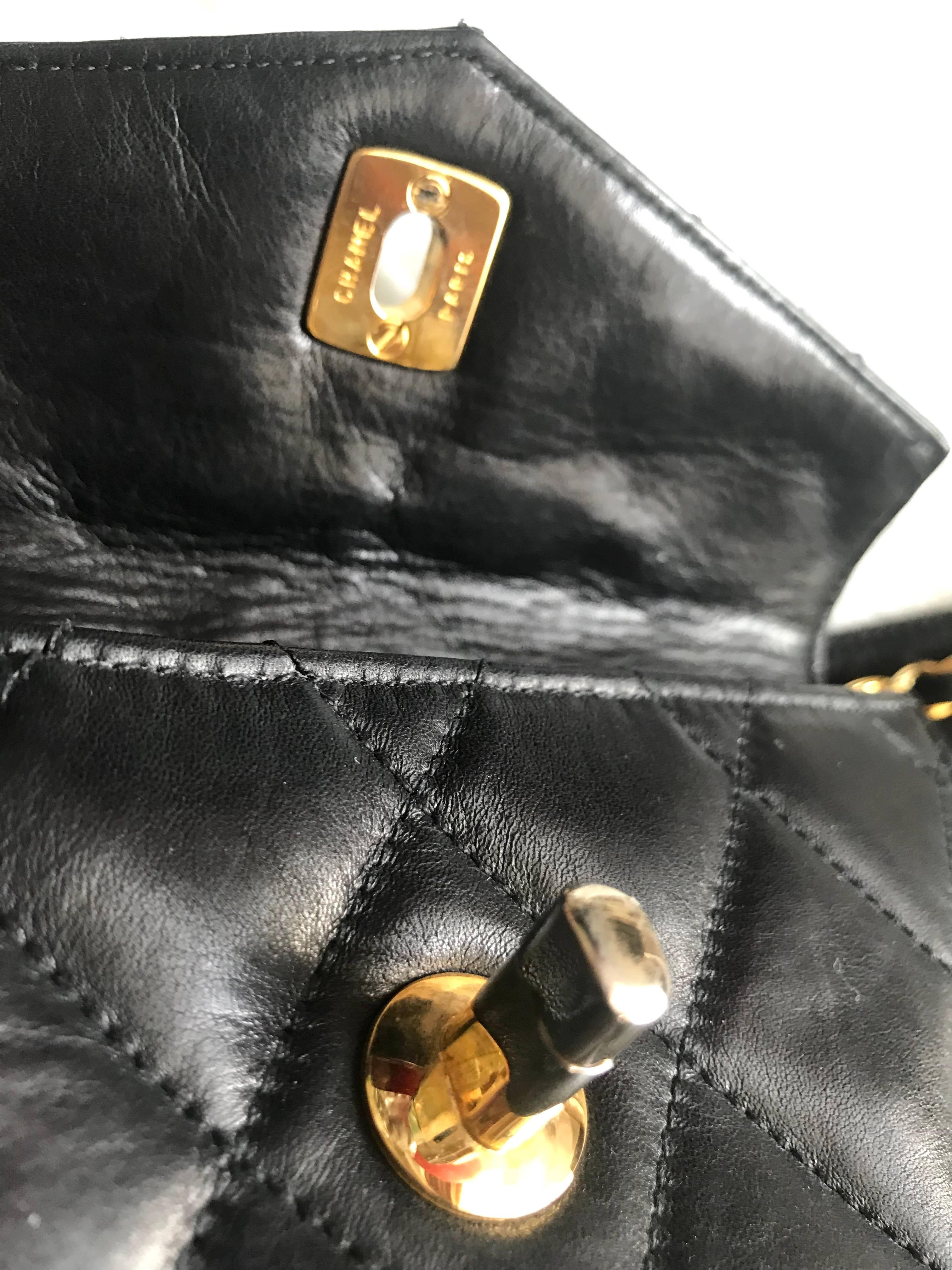 Vintage CHANEL black lamb waist bag, fanny pack with golden chain belt & CC. 2