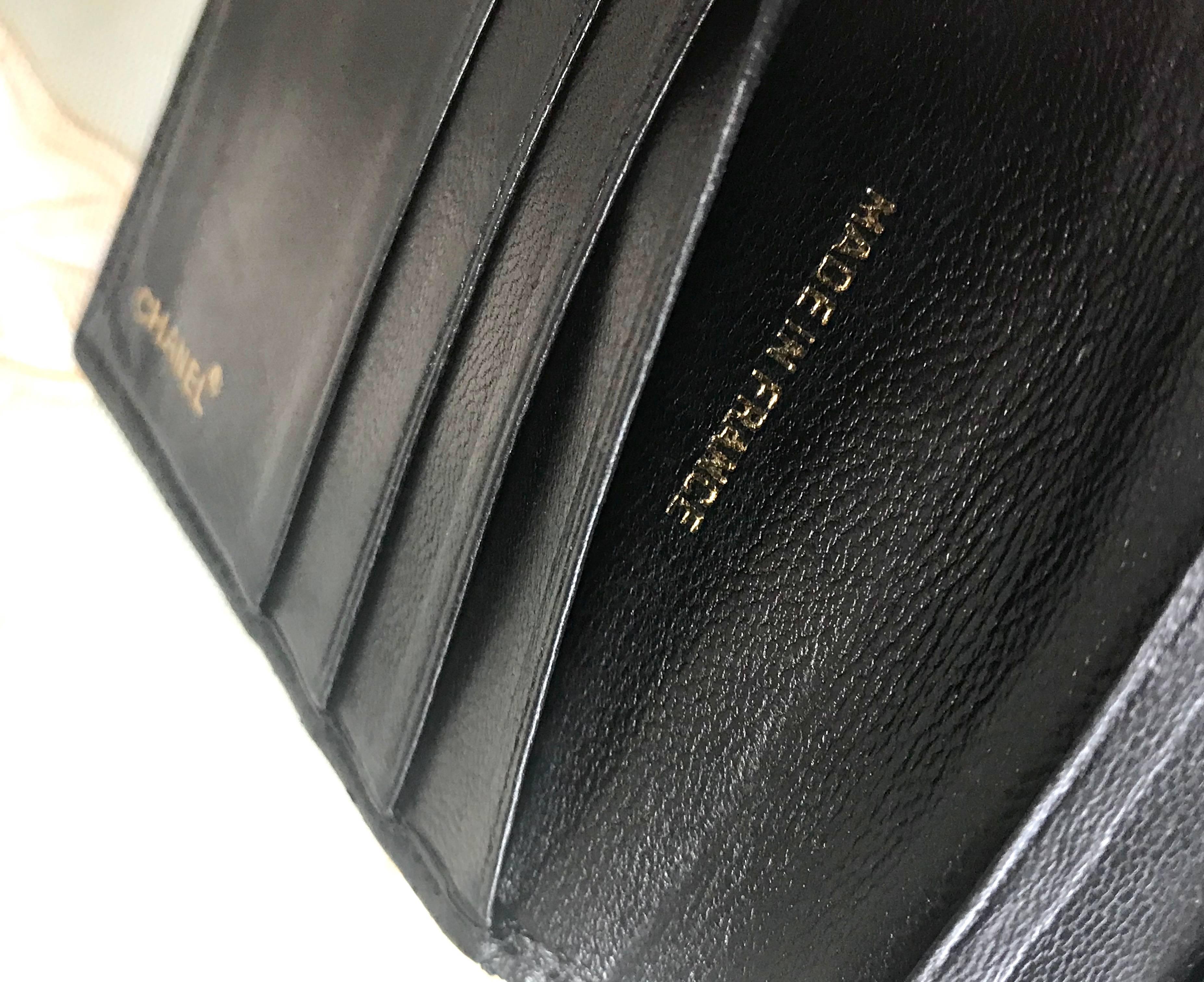 Vintage CHANEL black calfskin square stitched wallet, bill, card case. Unisex. For Sale 1