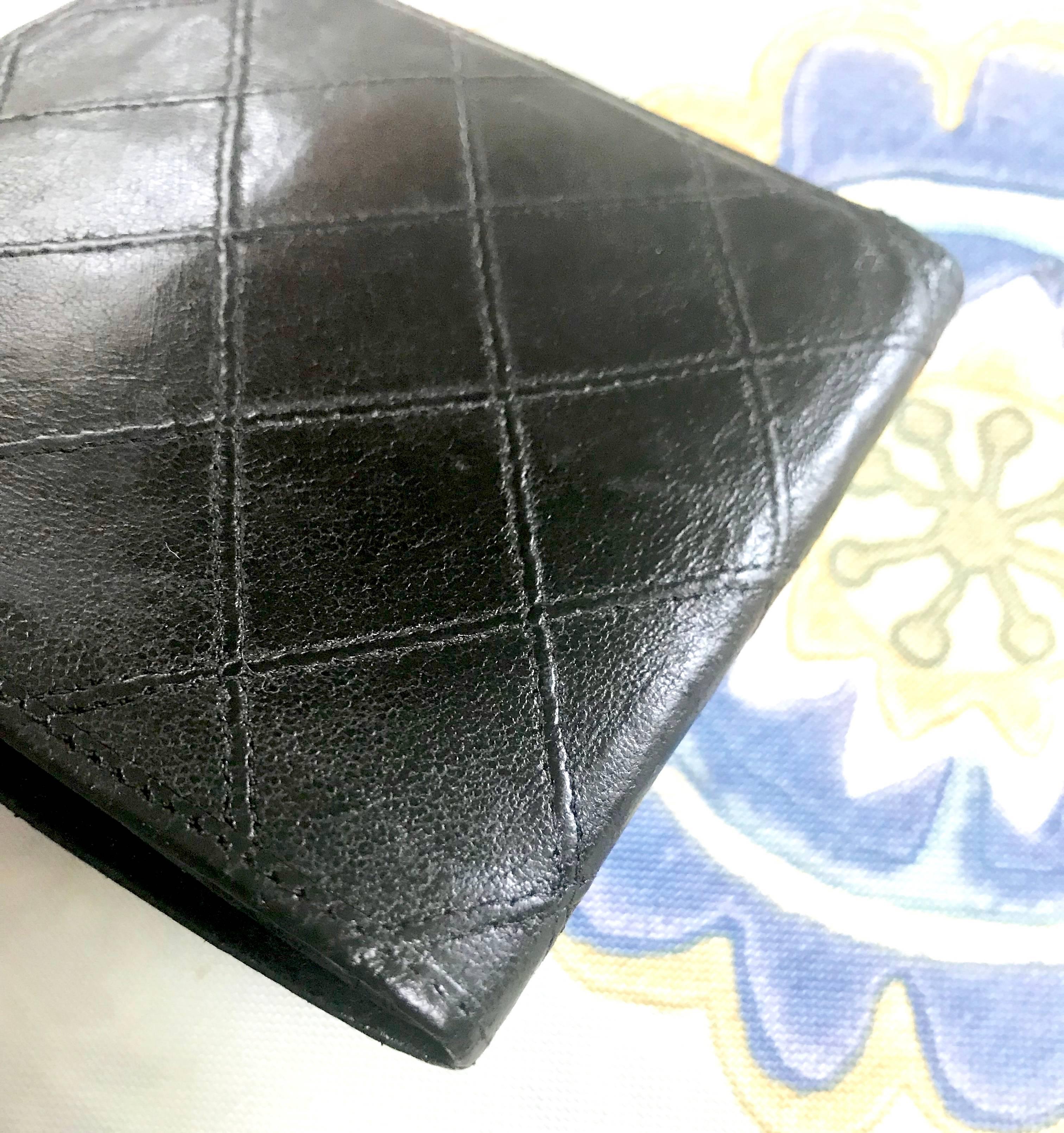 Black Vintage CHANEL black calfskin square stitched wallet, bill, card case. Unisex. For Sale