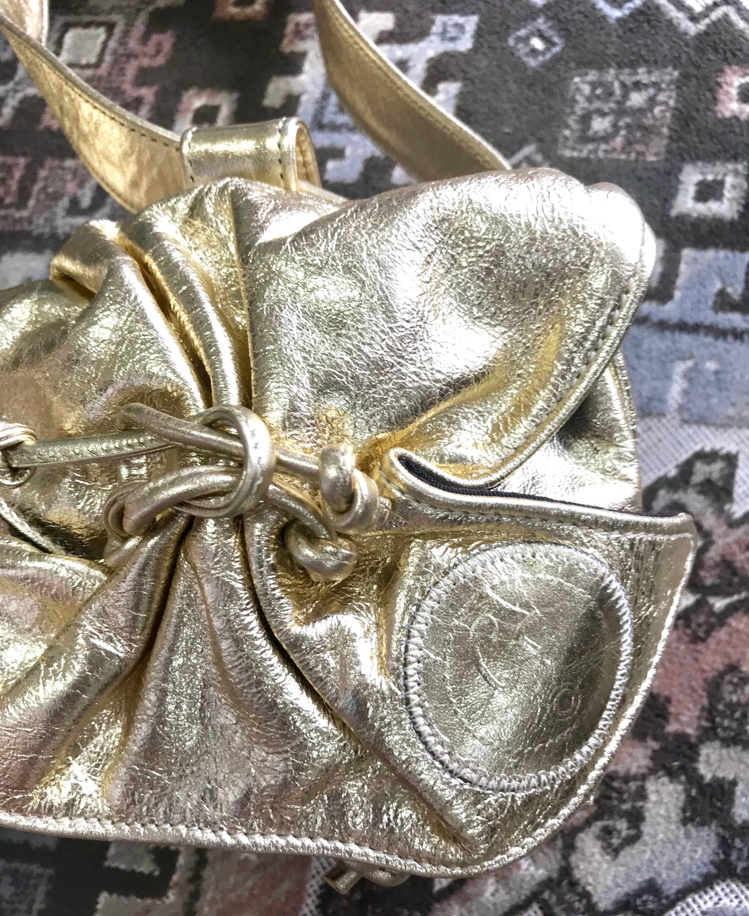 Women's Vintage Carlos Falchi golden metallic leather mini fanny pack. Can be pouch/belt