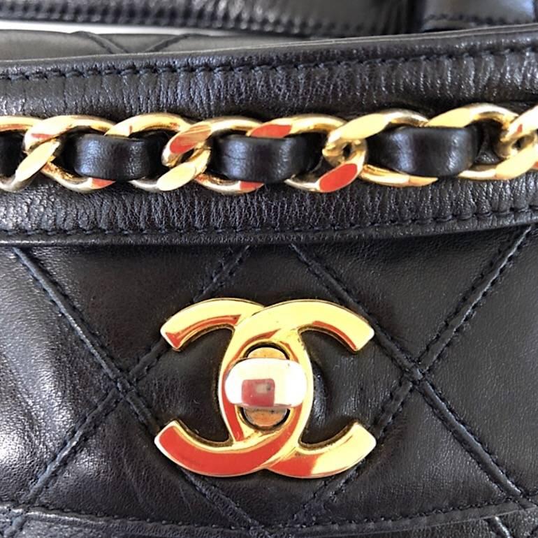 Vintage CHANEL black leather waist purse, fanny pack with golden chain belt. 1
