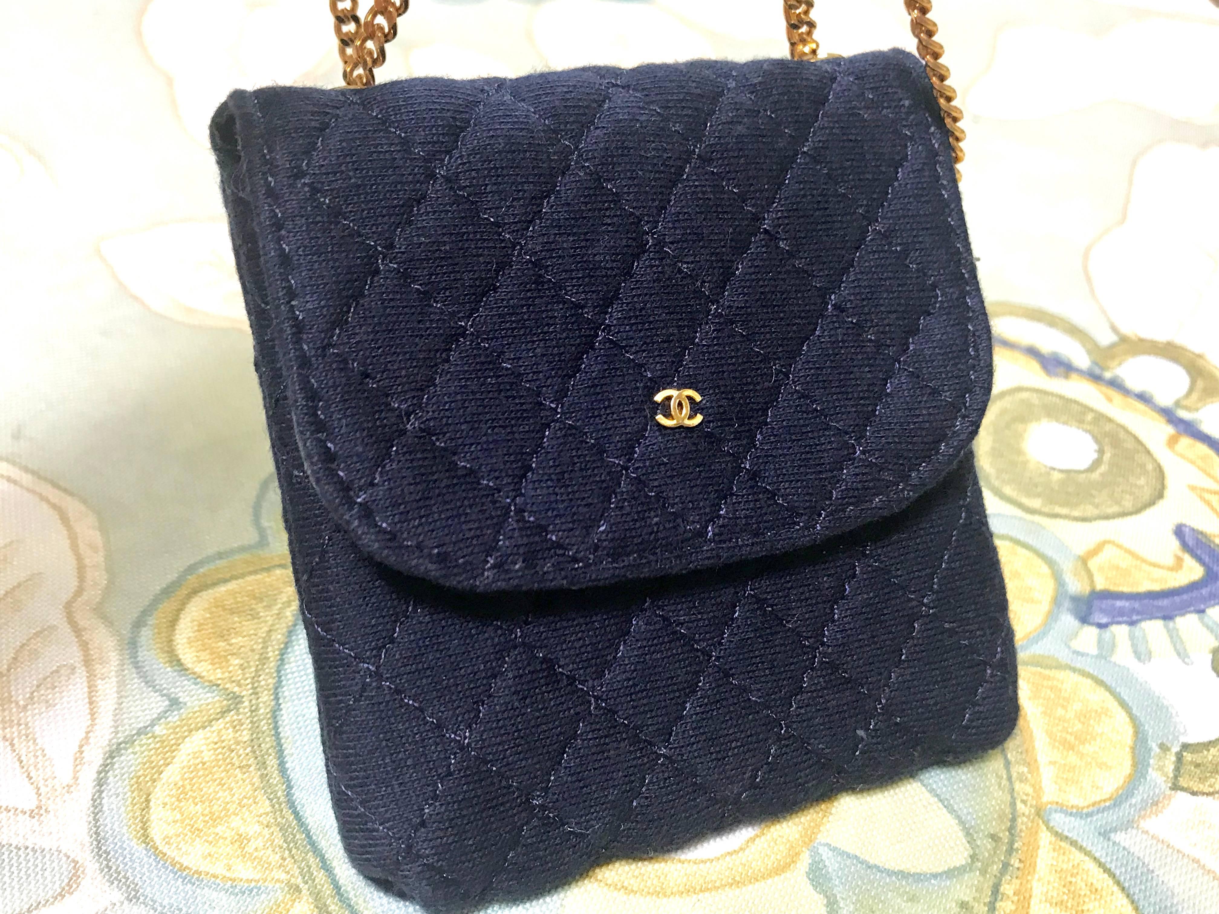 Women's or Men's MINT. Vintage Chanel navy quilted jersey mini pouch, coin purse, long necklace.