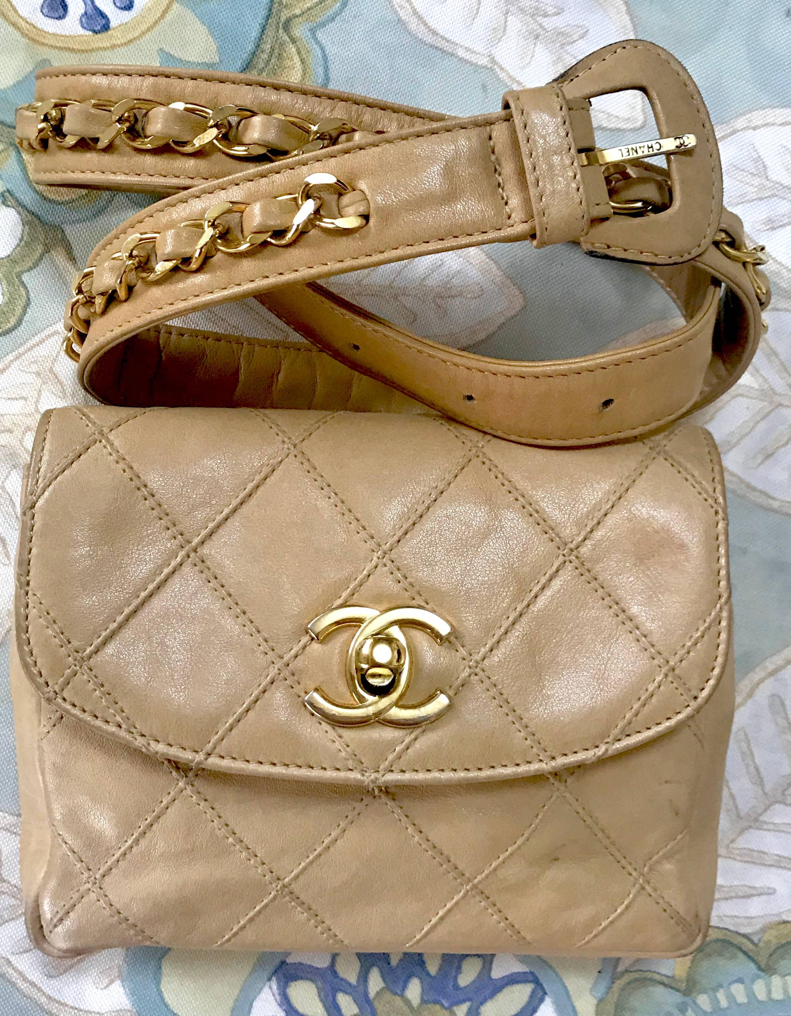 1990s. Vintage CHANEL beige leather waist purse, fanny pack, hip bag with gold CC closure and chain belt.  Belt would fit 26.7