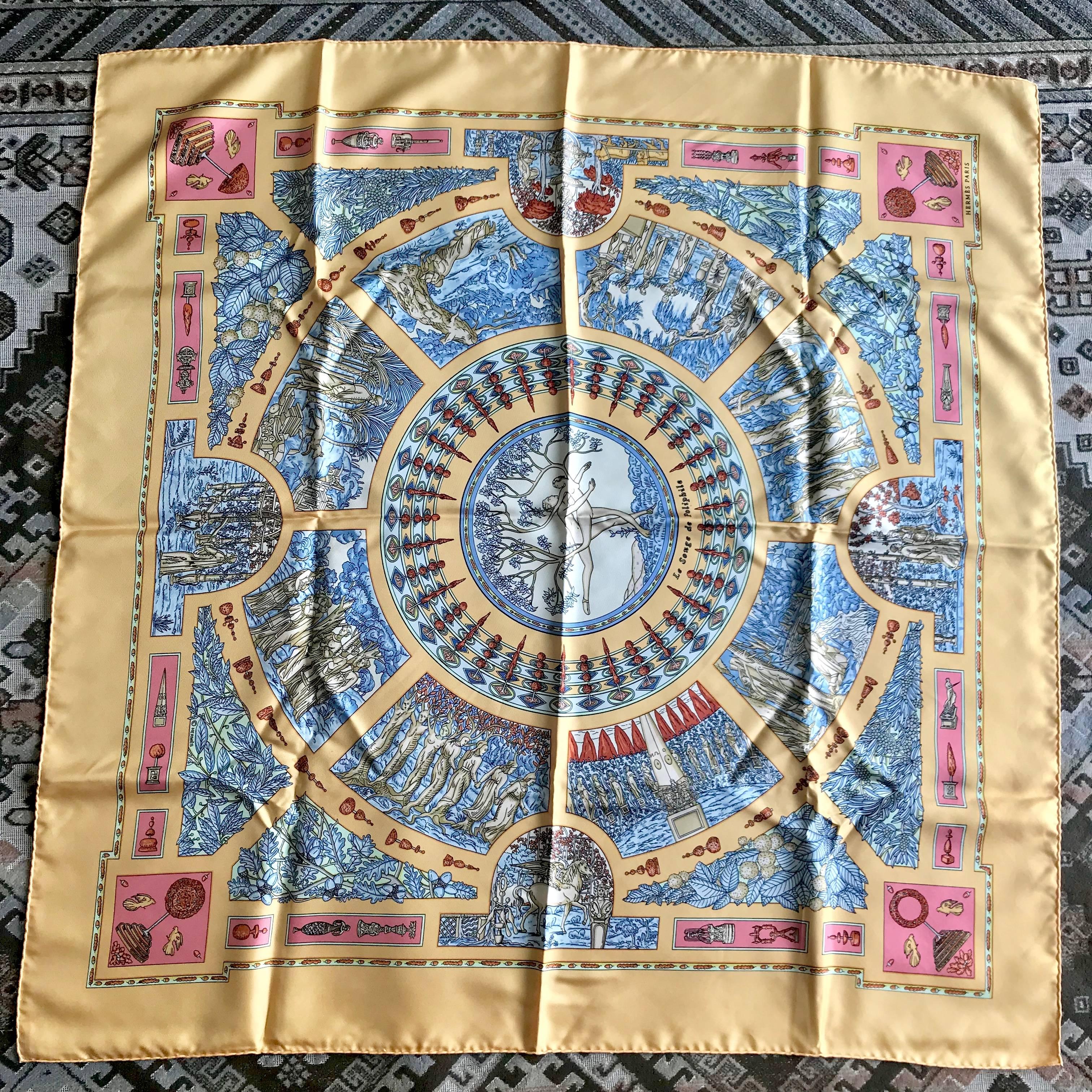 Beautiful condition! Don't miss...

1990s. Vintage HERMES Carre large silk scarf with cream yellow orange and blue tone print. Best foulard.  
Le Songe de Poliphile.  Classic foulard. Perfect gift idea. 

This is a 100% twill, large size silk Carre
