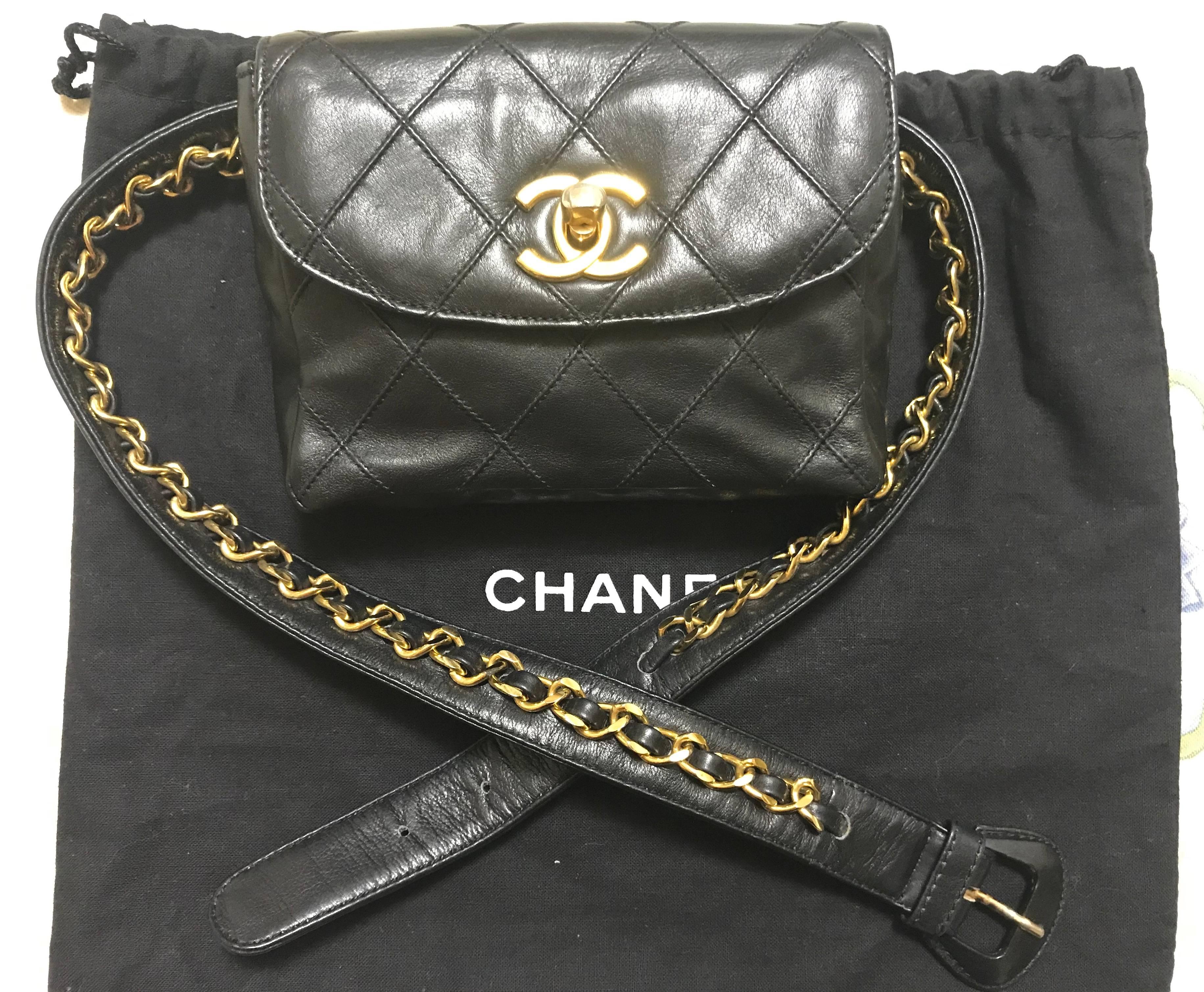 Excellent vintage condition!
1990s. Vintage CHANEL black calfskin leather waist bag, fanny pack with golden chain belt & CC closure. Belt size good for 30”-31.9”(76cm~80cm). 

Classic and most popular bag from CHANEL back in the 90's. Featuring the