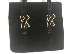 MINT. Vintage Paloma Picasso black velvet tote bag with golden logo motifs.