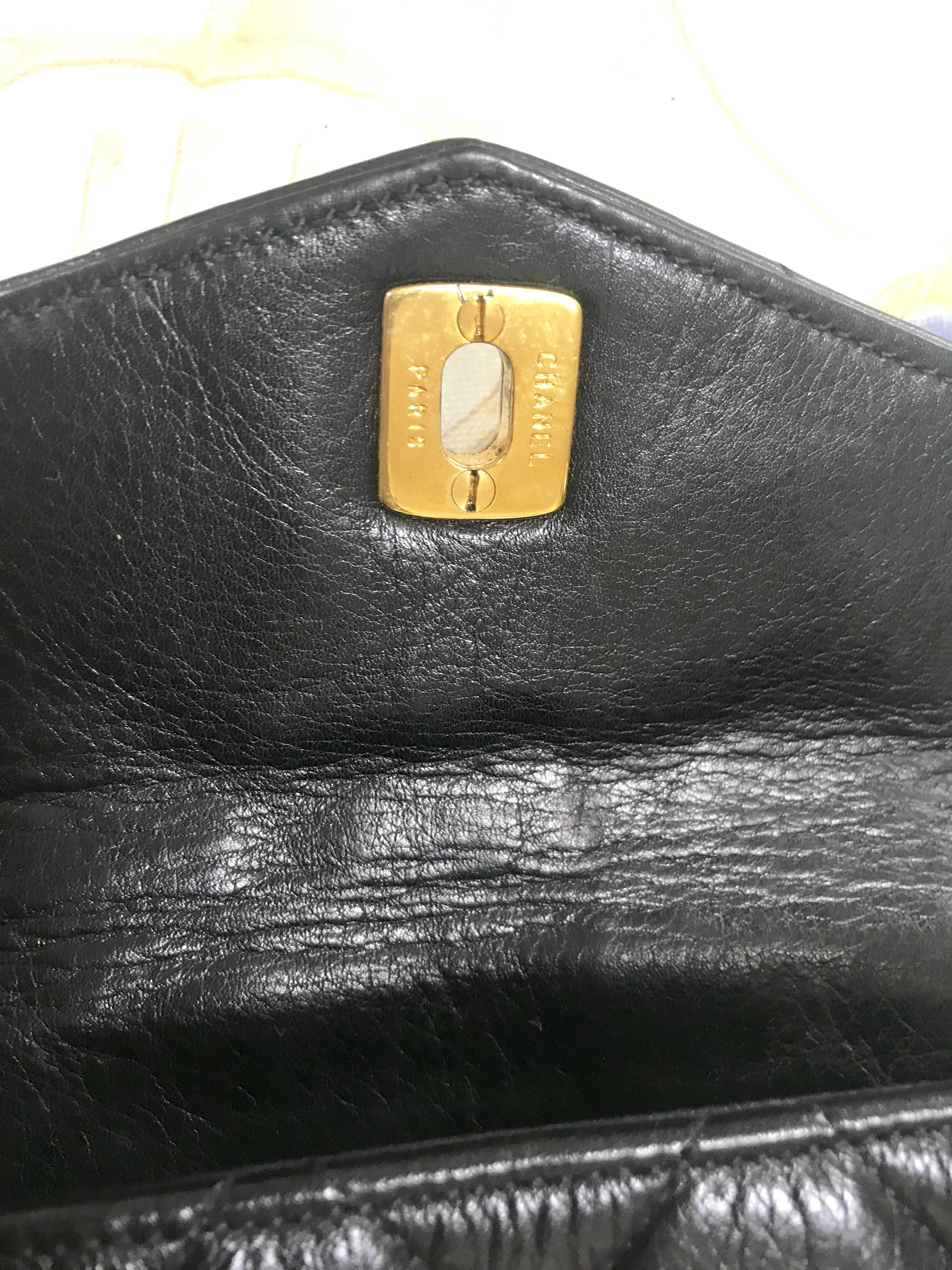 Vintage CHANEL black lamb belt bag, fanny pack with golden chain belt and CC. 4