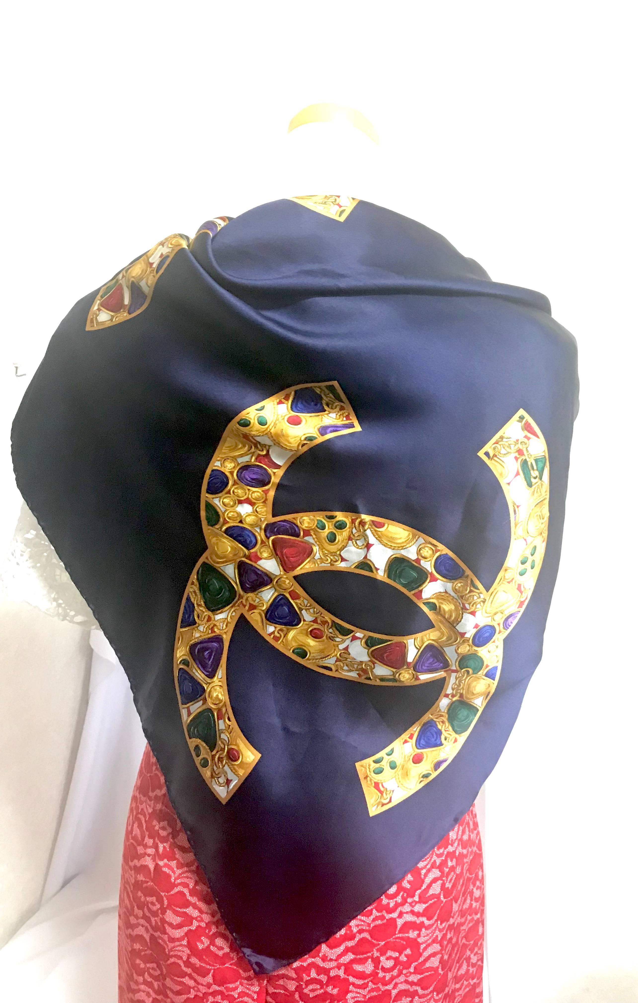 Vintage CHANEL navy silk scarf with gold, red, purple, green jewelry print in CC 1