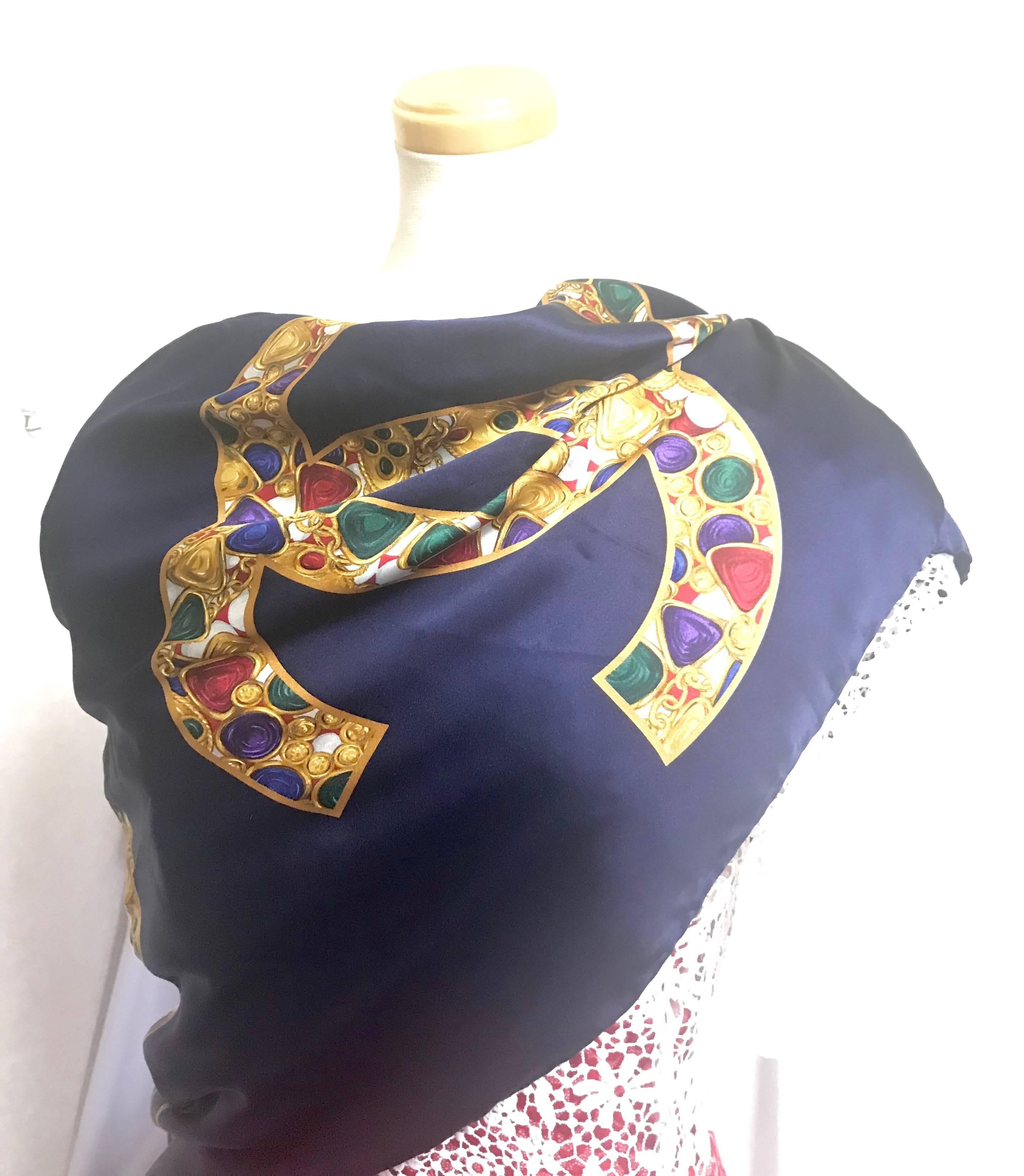 Vintage CHANEL navy silk scarf with gold, red, purple, green jewelry print in CC 2