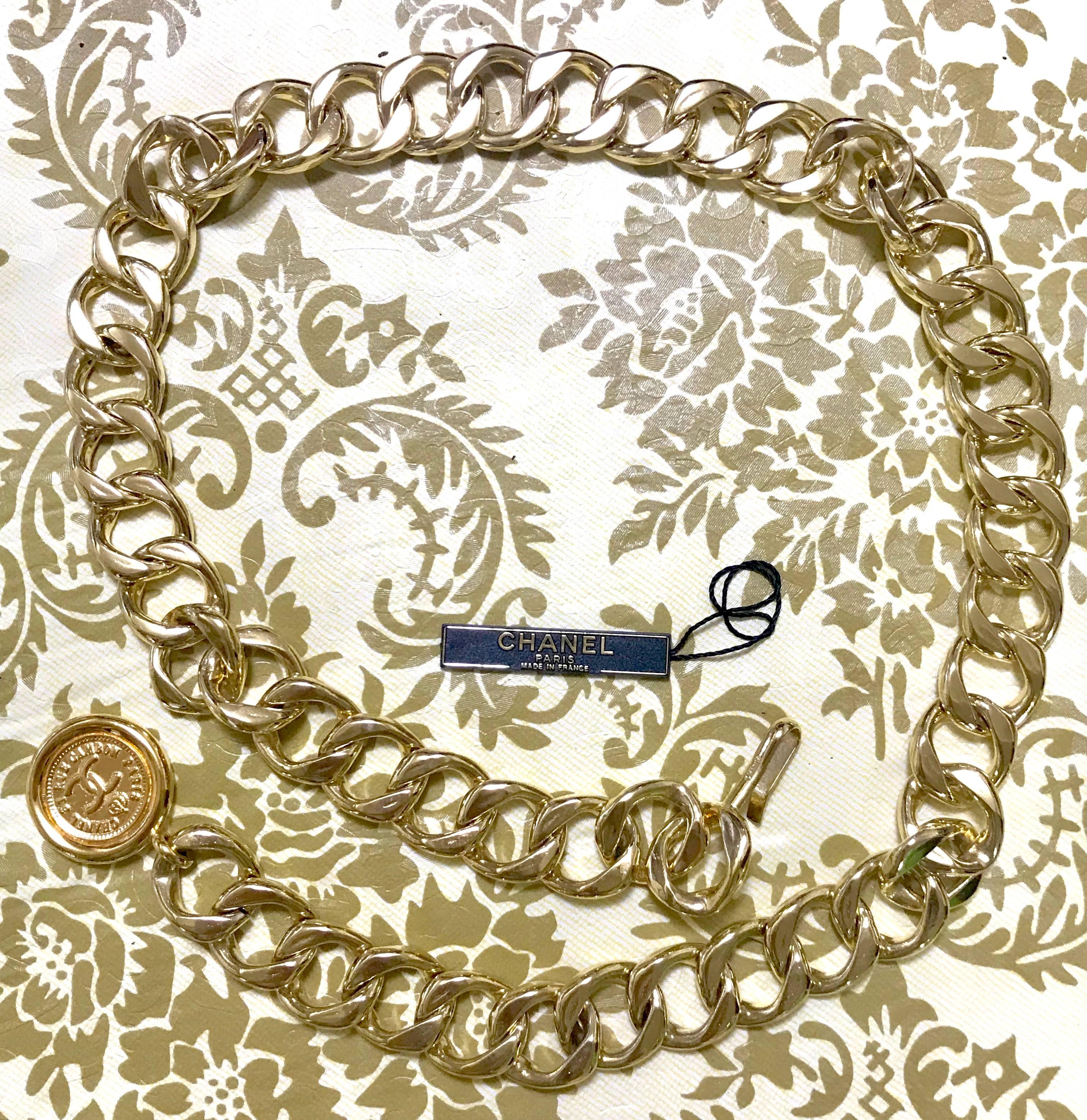 MINT. Vintage CHANEL golden thick chain belt with CC and mademoiselle charm. For Sale 1