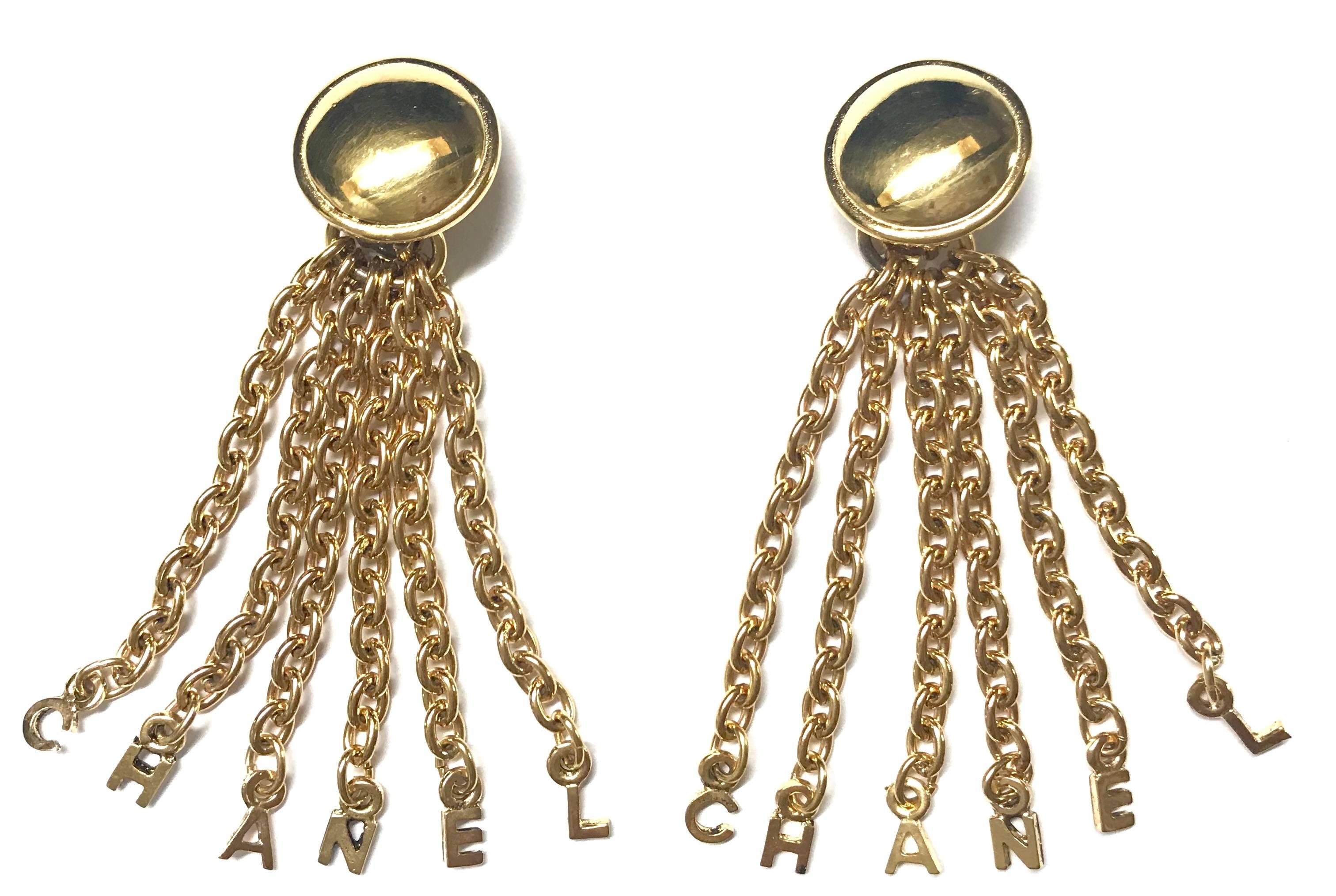 1980-1990s. Vintage CHANEL golden round motif and logo letter dangling earrings. 
Rare and adorable jewelry for your collection. Can be 2 way use.

Introducing one-of-a-kind vintage CHANEL jewelry piece from late 80’s through early 90’s, the letter