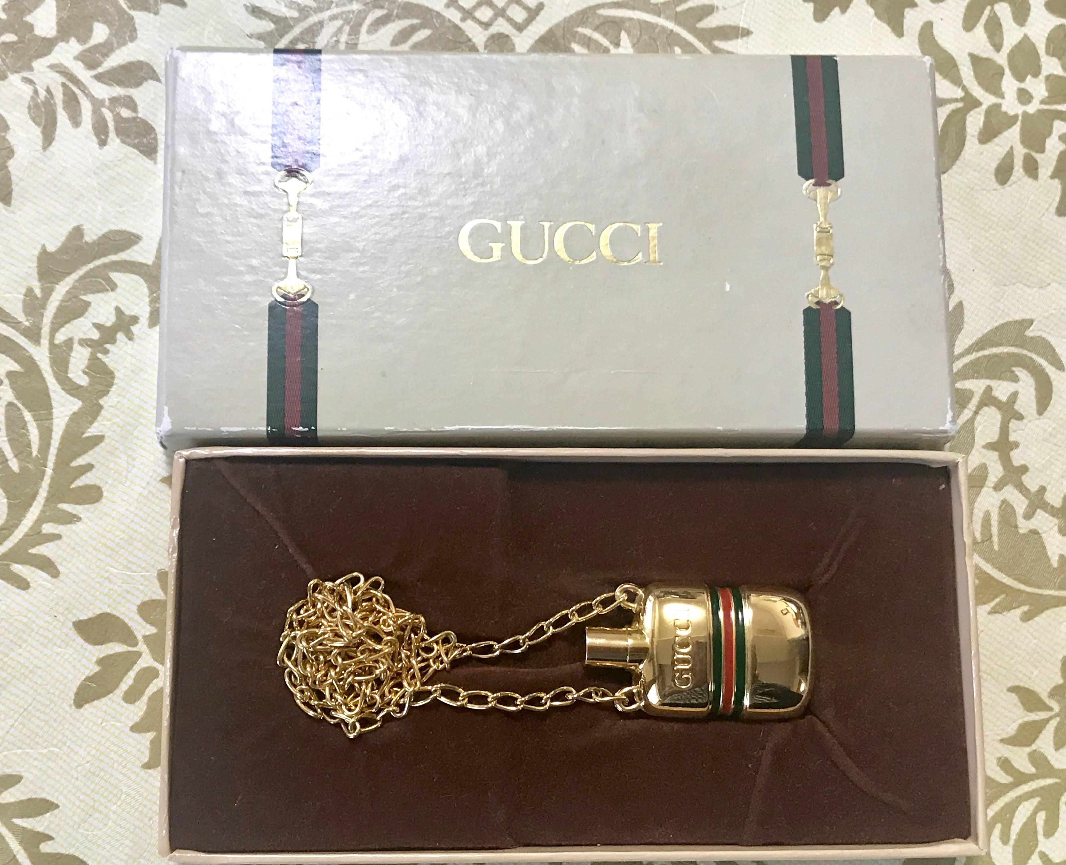 Women's or Men's MINT. Vintage Gucci golden mini perfume, eau de cologne bottle chain necklace.
