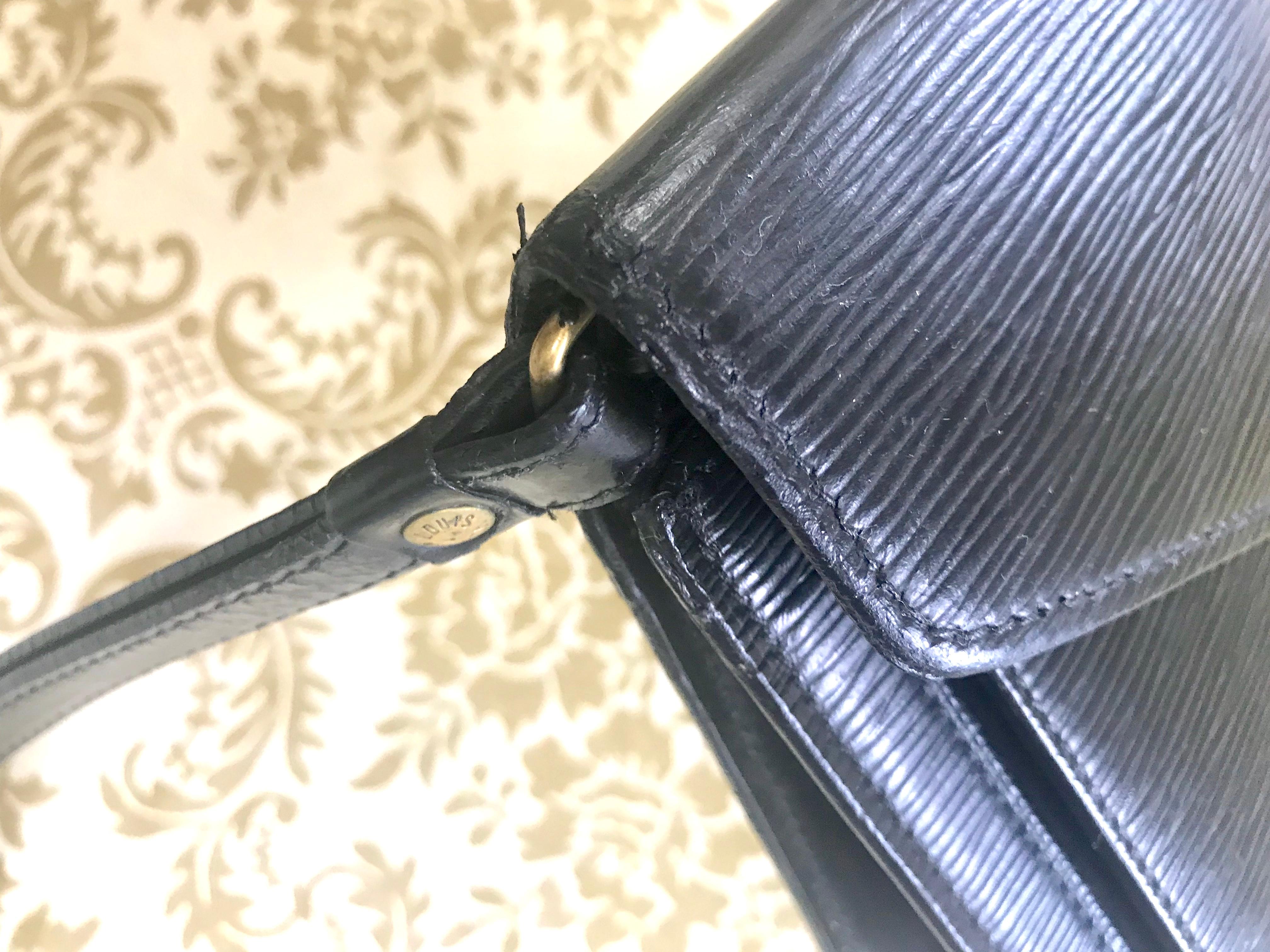 Women's or Men's Vintage Louis Vuitton black epi leather wristlet clutch bag, purse with strap.  For Sale