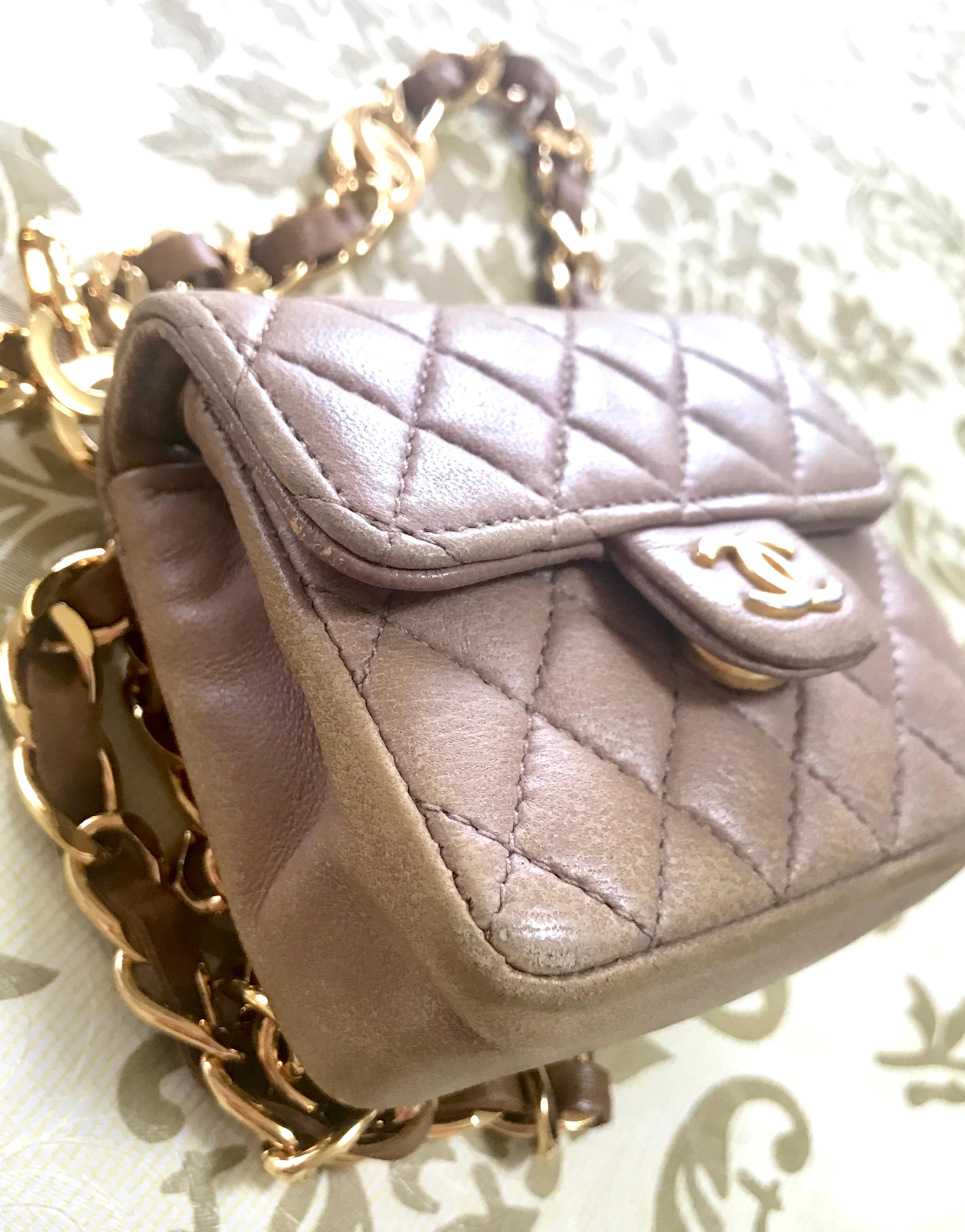 Chanel Vintage brown lambskin mini 2.55 bag charm and golden chain belt with CC For Sale 1