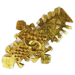 Vintage CHANEL Gold tone brooch in cross shape with CC motif.