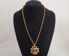 Vintage CHANEL golden chain necklace with wavy petal frame & CC mark pendant top