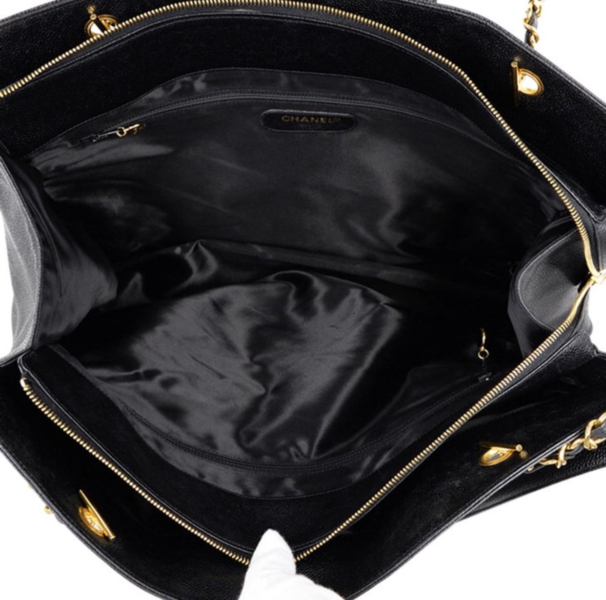Vintage CHANEL black caviar leather Overnighter, Weekender bag, large chain bag. 1