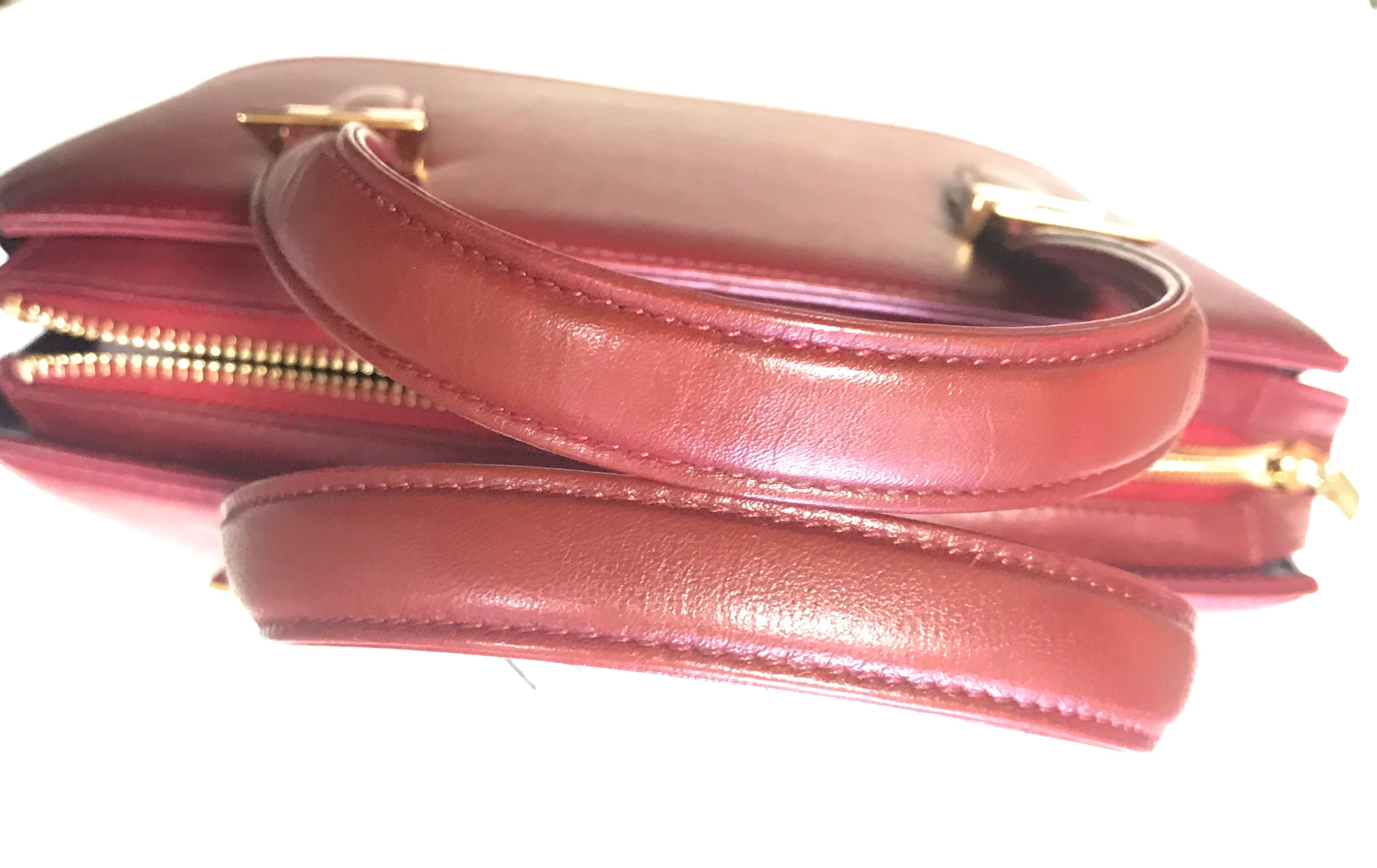 Vintage Valentino Garavani wine leather handbag with golden buckles. Classic bag For Sale 3