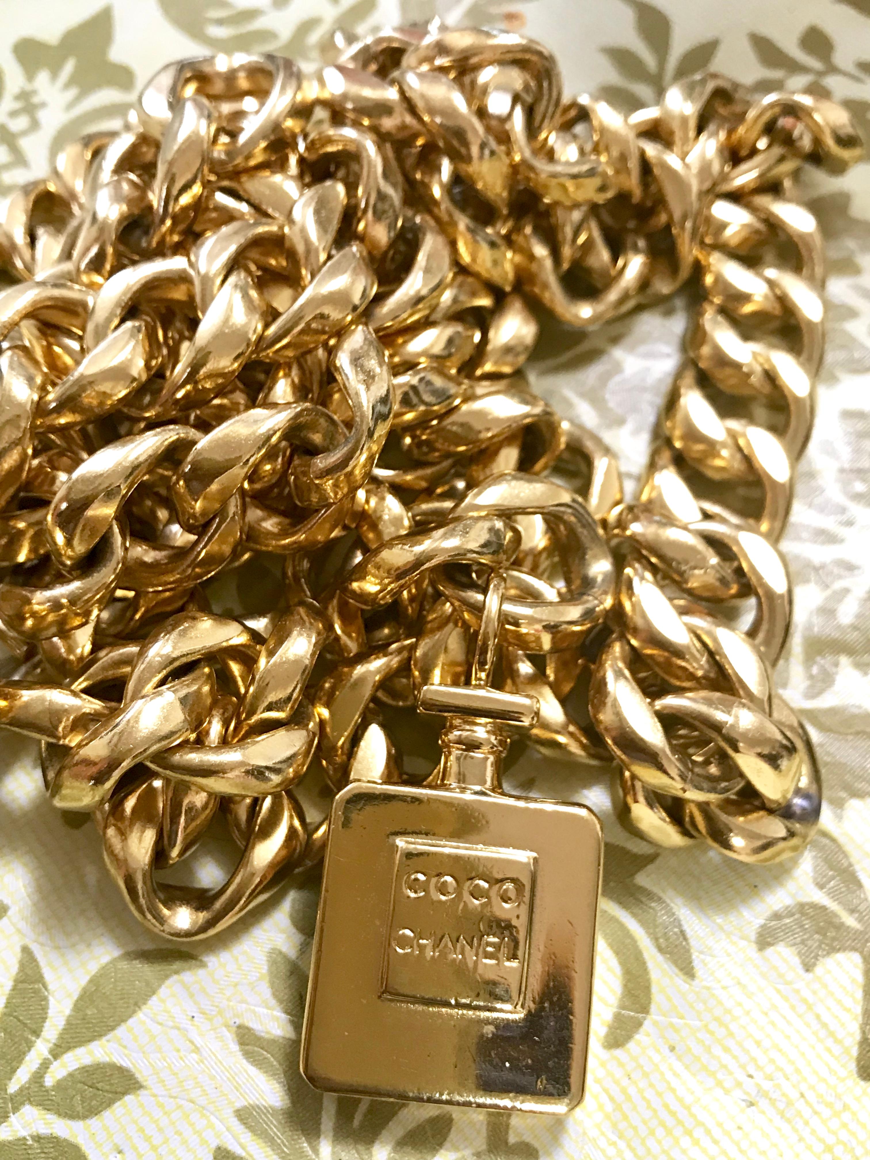 Vintage CHANEL golden nice and heavy thick chain belt with perfume bottle motif. For Sale 1