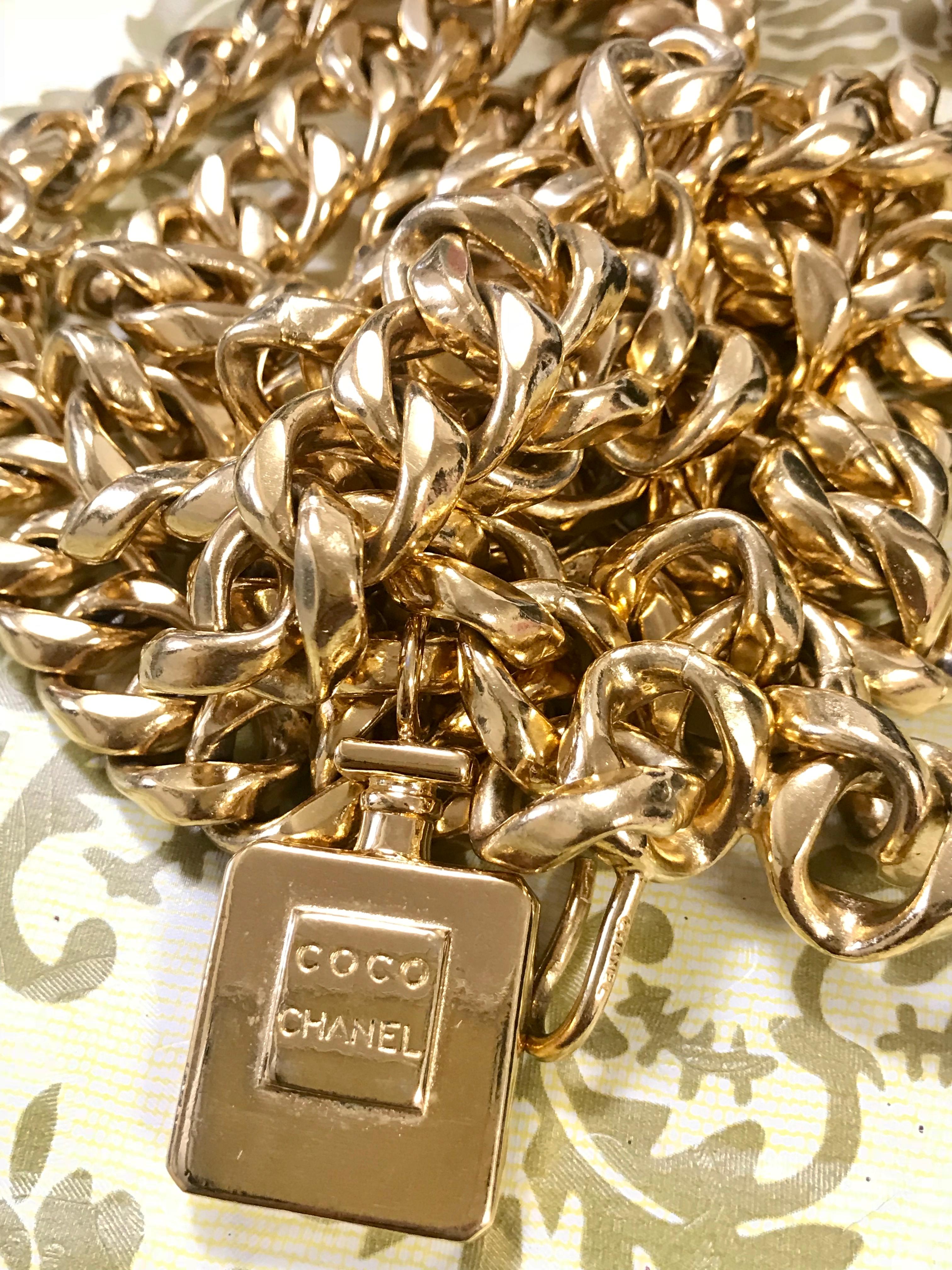 Vintage CHANEL golden nice and heavy thick chain belt with perfume bottle motif. For Sale 2