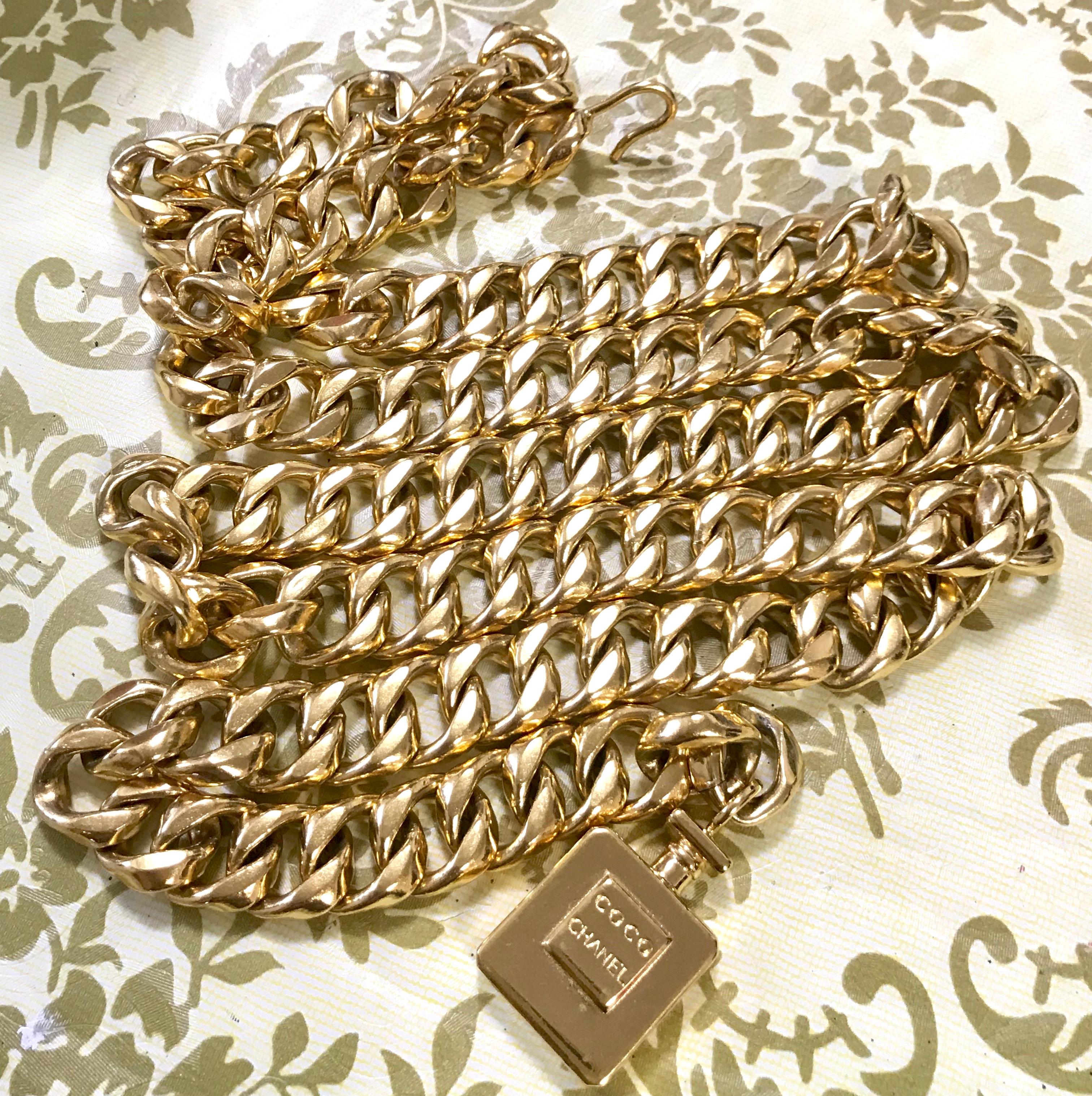 Women's Vintage CHANEL golden nice and heavy thick chain belt with perfume bottle motif. For Sale