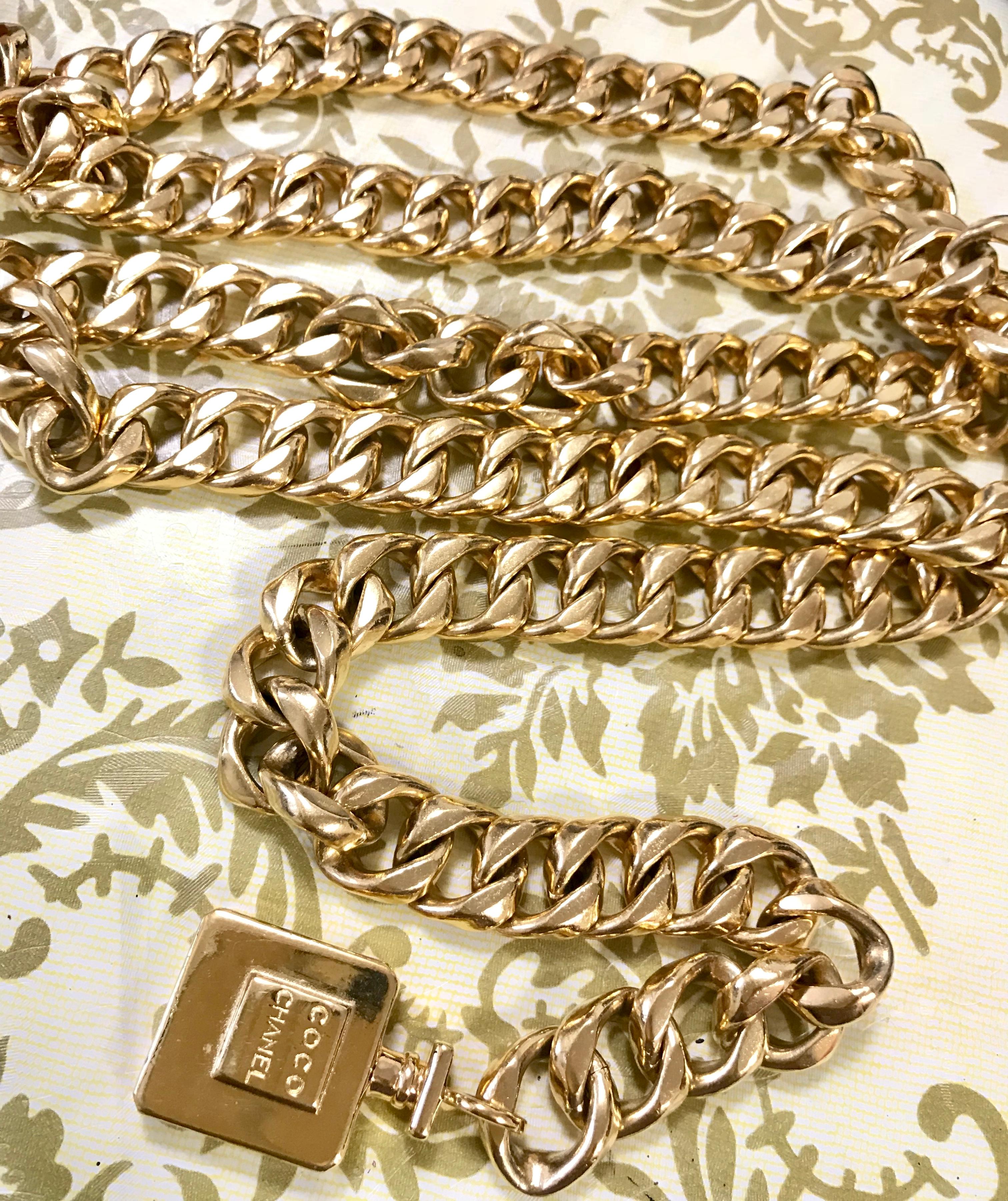 Vintage CHANEL golden nice and heavy thick chain belt with perfume bottle motif. For Sale 6