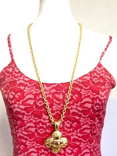 MINT. Vintage CHANEL chain necklace with arabesque petal flower, clover CC top.