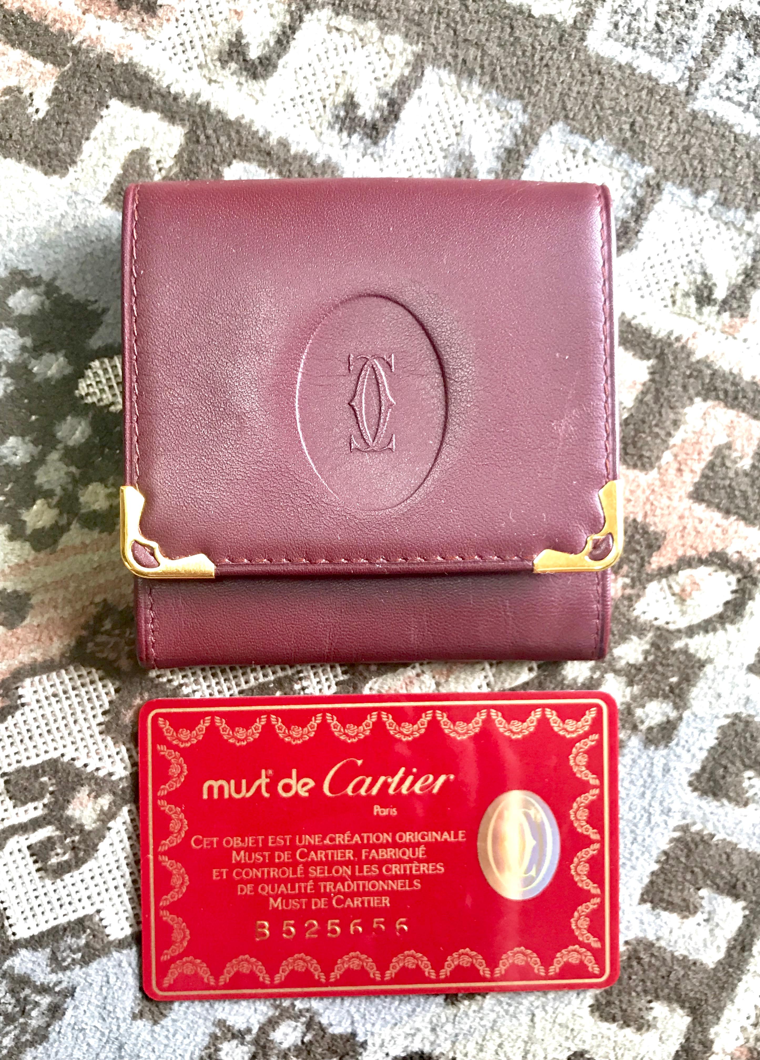 Women's or Men's Vintage Cartier wine leather coin case with gold tone frames. must de Cartier. For Sale