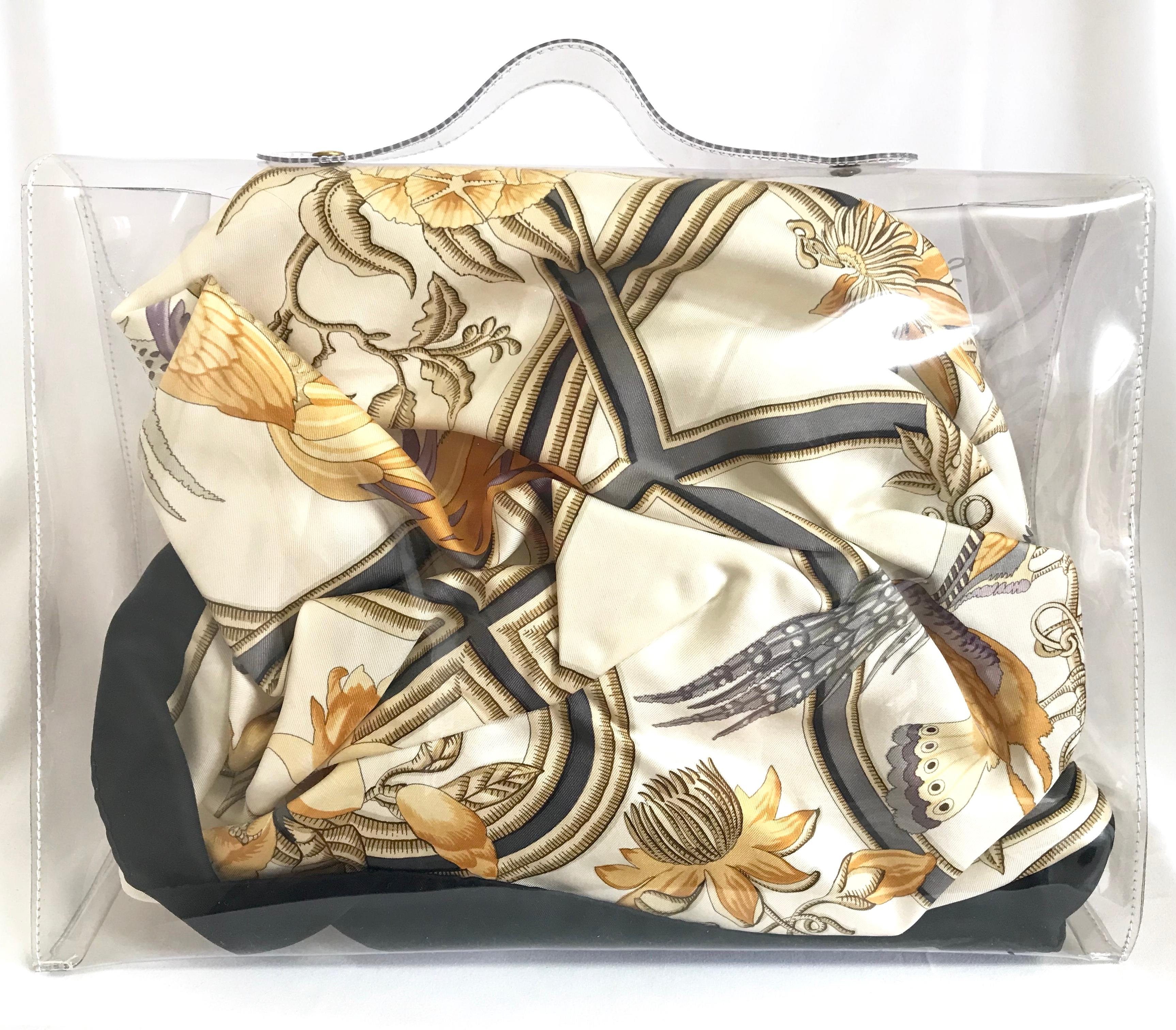*****Please note that the scarf in the bag is for display purpose only. Not for SALE****
MINT. 1990s. Vintage Hermes rare, clear transparent vinyl Kelly bag, Japan limited Edition. 
Rare masterpiece.

The vinyl Kelly was first born in 1996 for more