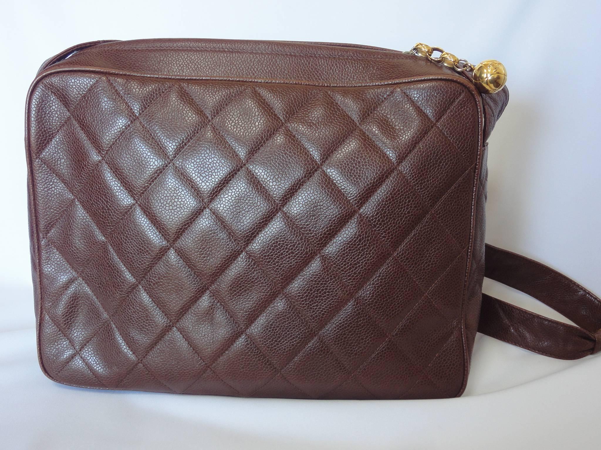 This is a rare vintage dark brown caviar leather shoulder bag from CHANEL from the 90s.
As this is a large size and square messenger bag style, it holds lots of things you need to carry.
Perfect daily use vintage Chanel bag for unisex, all