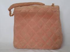 Vintage CHANEL light pink quilted suede 2.55 shoulder bag with gold tone chain