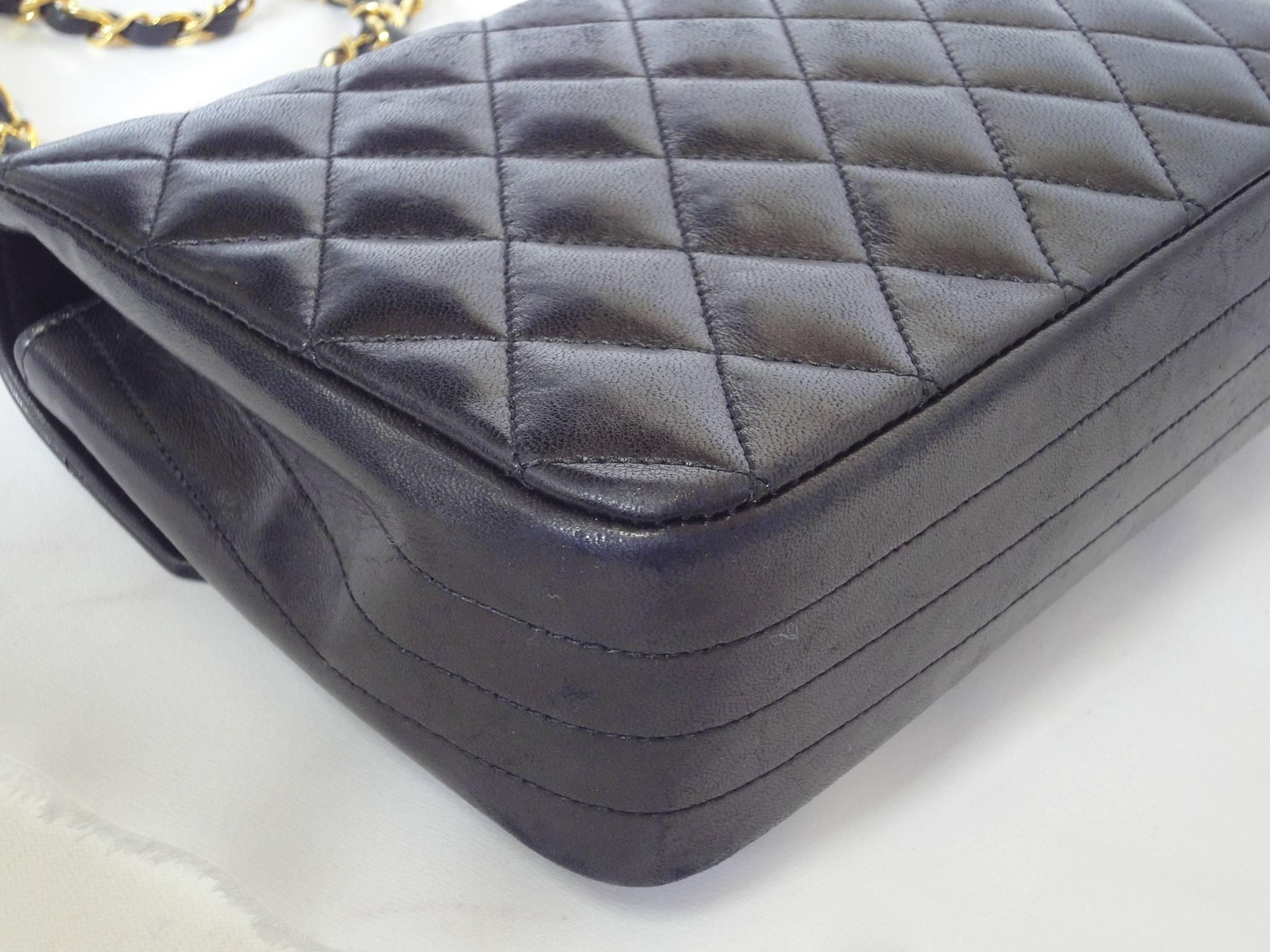 1980s vintage Chanel black lamb leather 2.55 classic oval flap shoulder bag. In Excellent Condition In Kashiwa, Chiba