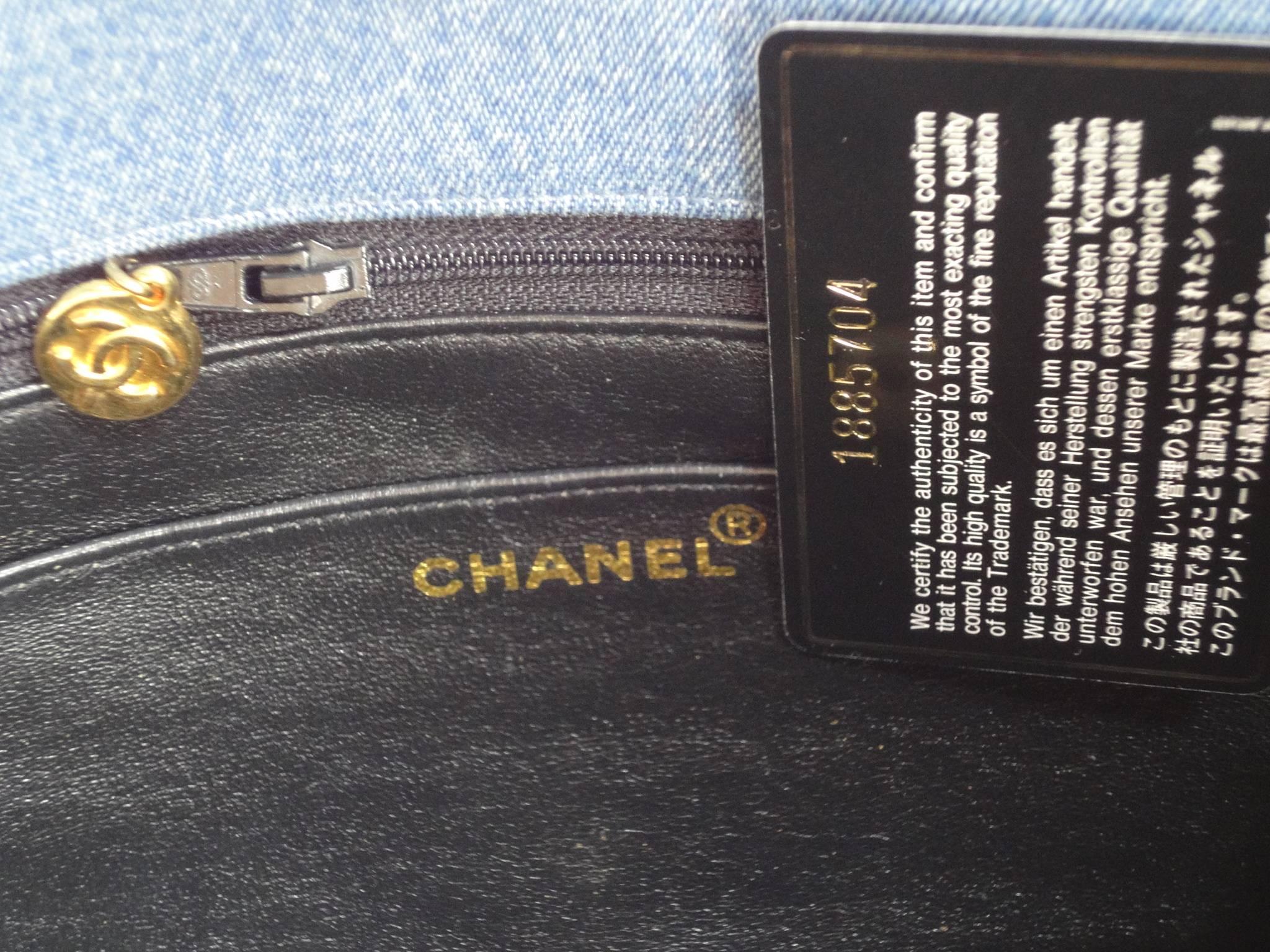 Vintage CHANEL denim bag with golden cc closure and vertical stitches.  3