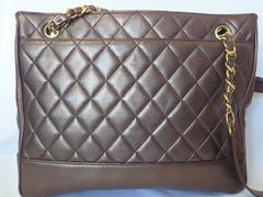 Vintage CHANEL gunmetal, bronze lambskin tote bag with gold tone chains and CC.