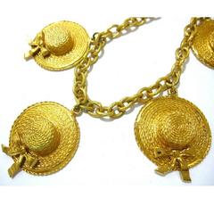 Vintage CHANEL rare jewelry, dangling hat design charm chain statement necklace.
