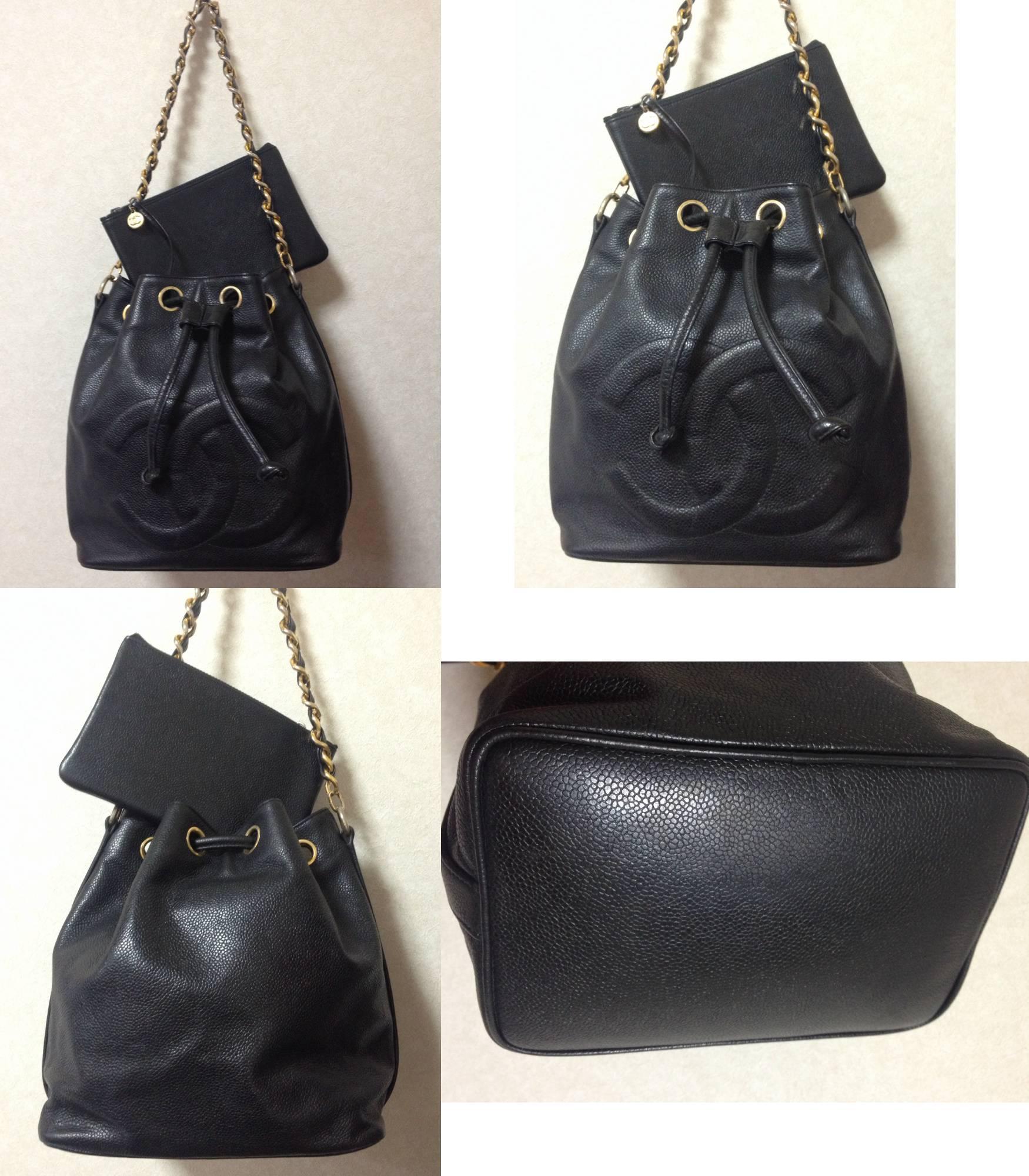 Women's Vintage CHANEL black caviar leather hobo bucket shoulder bag with golden chain