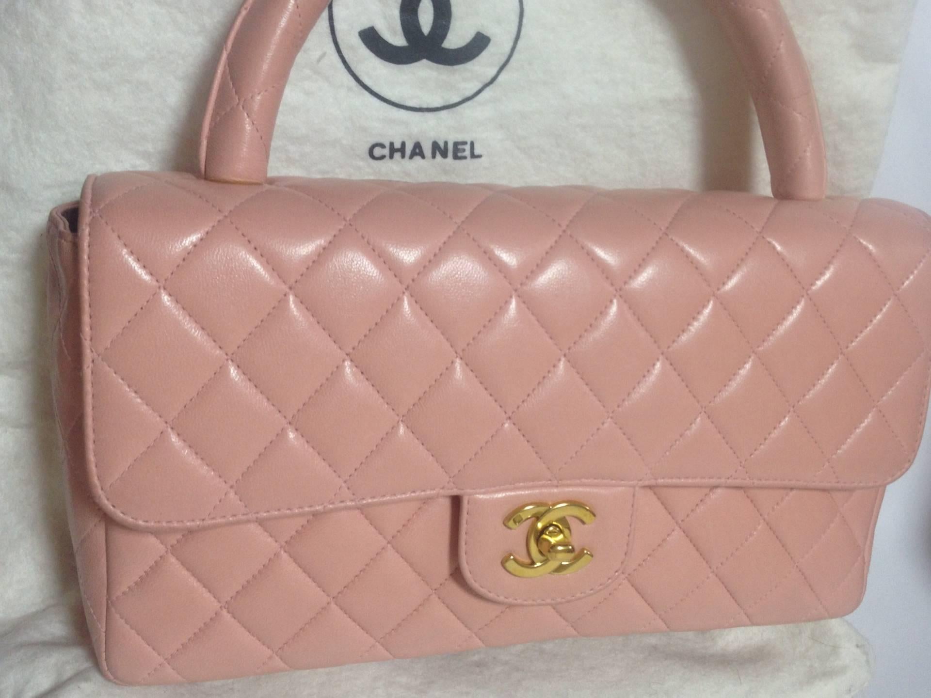 1990. Vintage CHANEL milky pink color lambskin classic 2.55 handbag purse with golden CC. Rare color classic bag.

Introducing another fabulous vintage purse in milky pink lambskin 2.55 style from Chanel back in the 90's.
Classic style but rare and